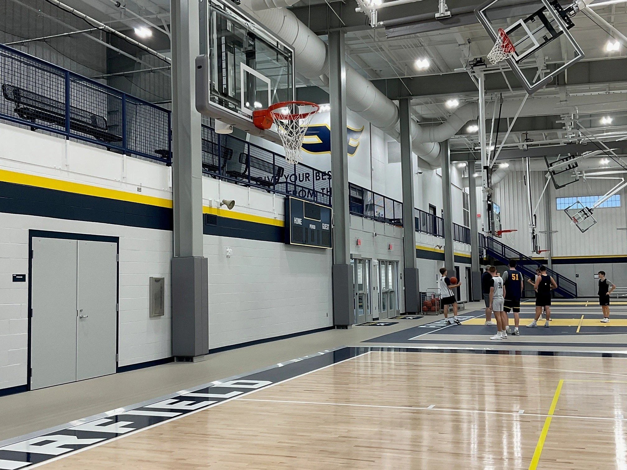 Elevated Spectator Viewing Area Protected by Custom Fabricated Steel Mesh Guardrails.
