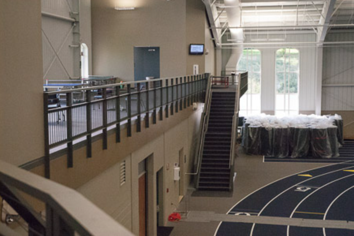 Interior Steel Guardrail System Along the Upper‑Level Circulation Path at Hillsdale College Athletic Facilities.