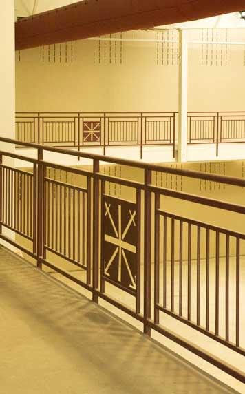 Decorative Metal Railing Panels Integrated into the Interior Balcony System.