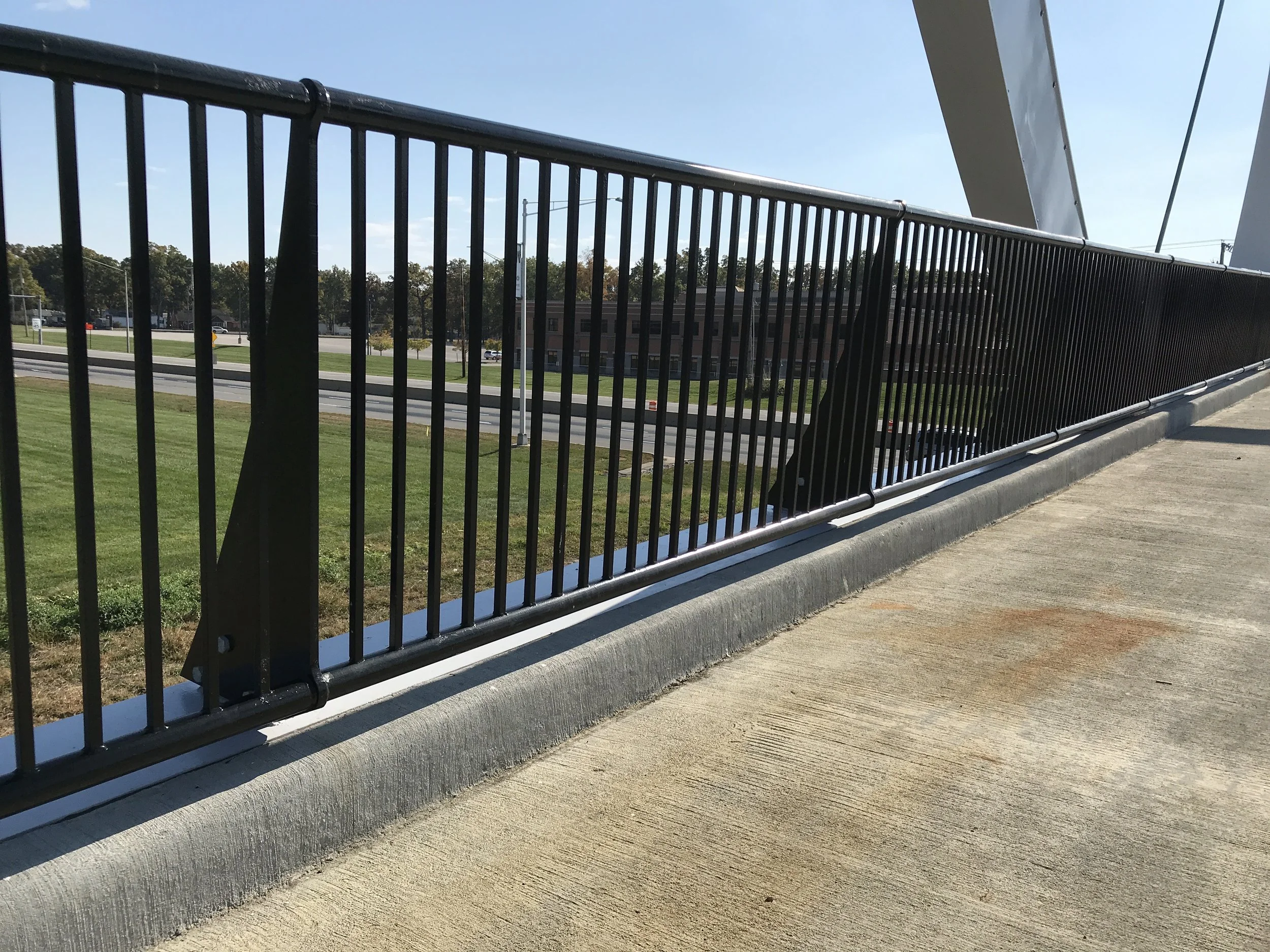 Steel Pedestrian Bridge Guardrail System Fabricated to Provide Safety and Durability Along the Walkway Edge.