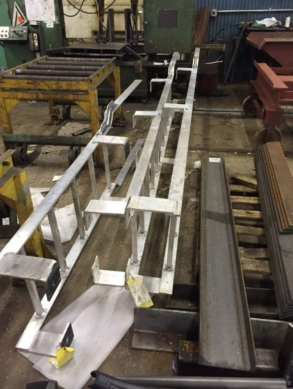 Custom steel frame fabricated in metal fabrication shop.