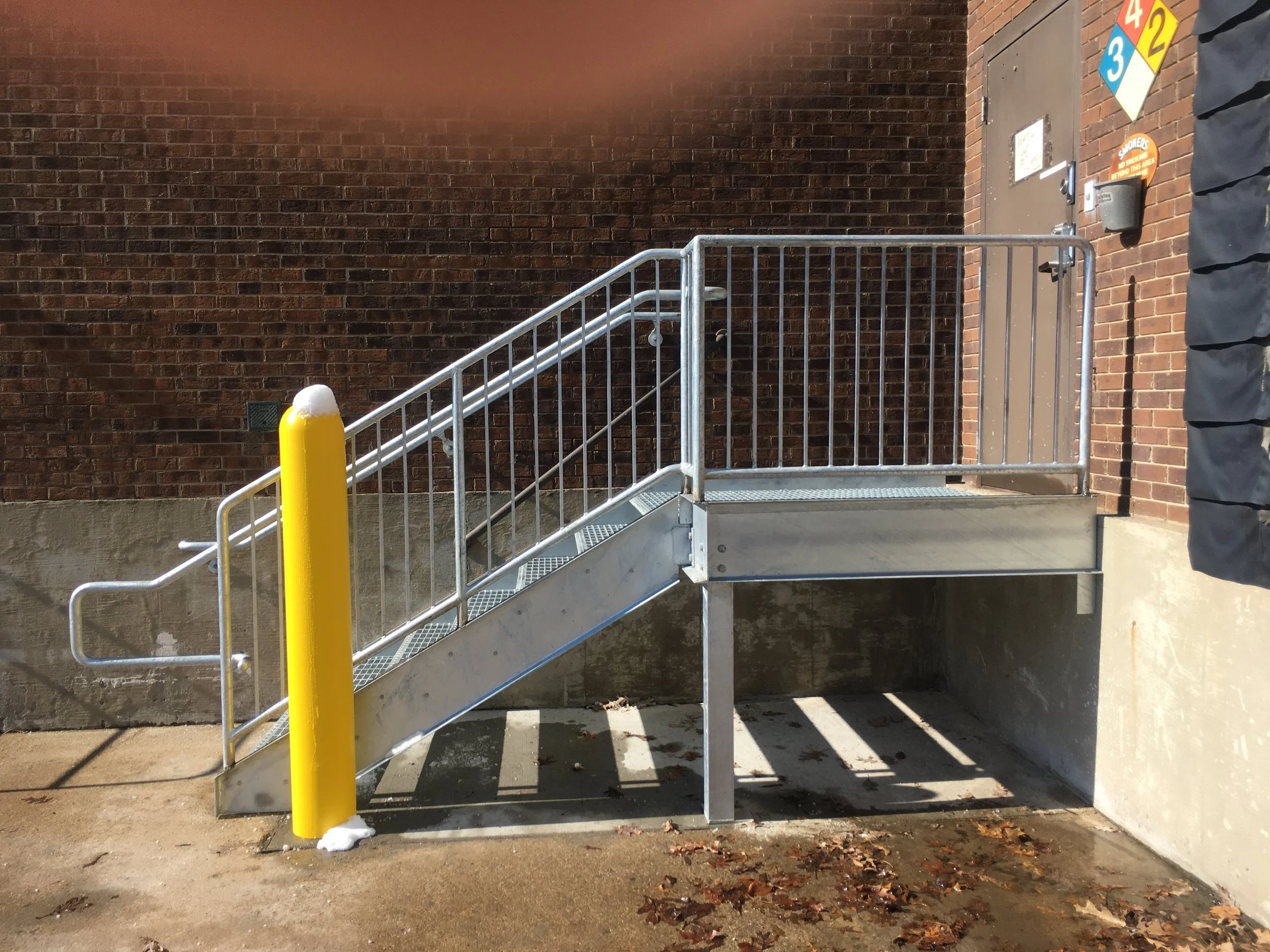 Structural Steel Stairs and Guardrails Designed for Safe Access to Elevated Service Areas.