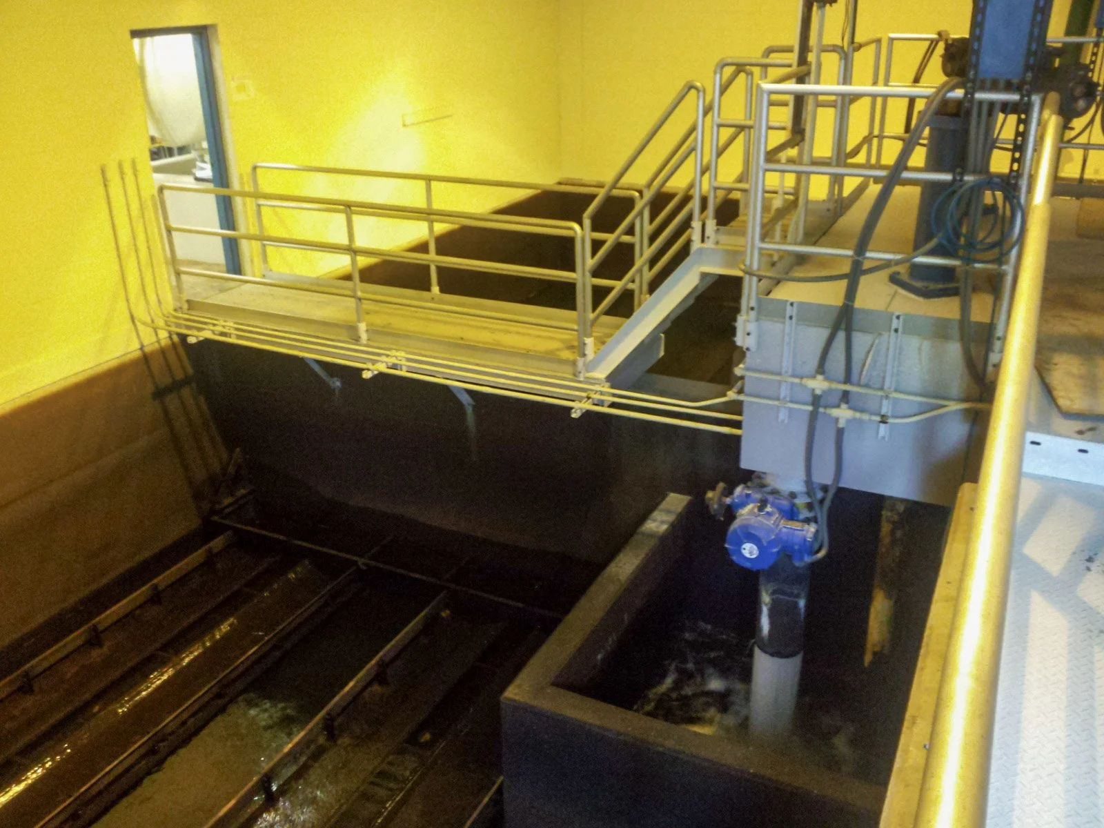 Corrosion-Resistant Platform and Guardrail System Providing Safe Access Above Treatment Basins.