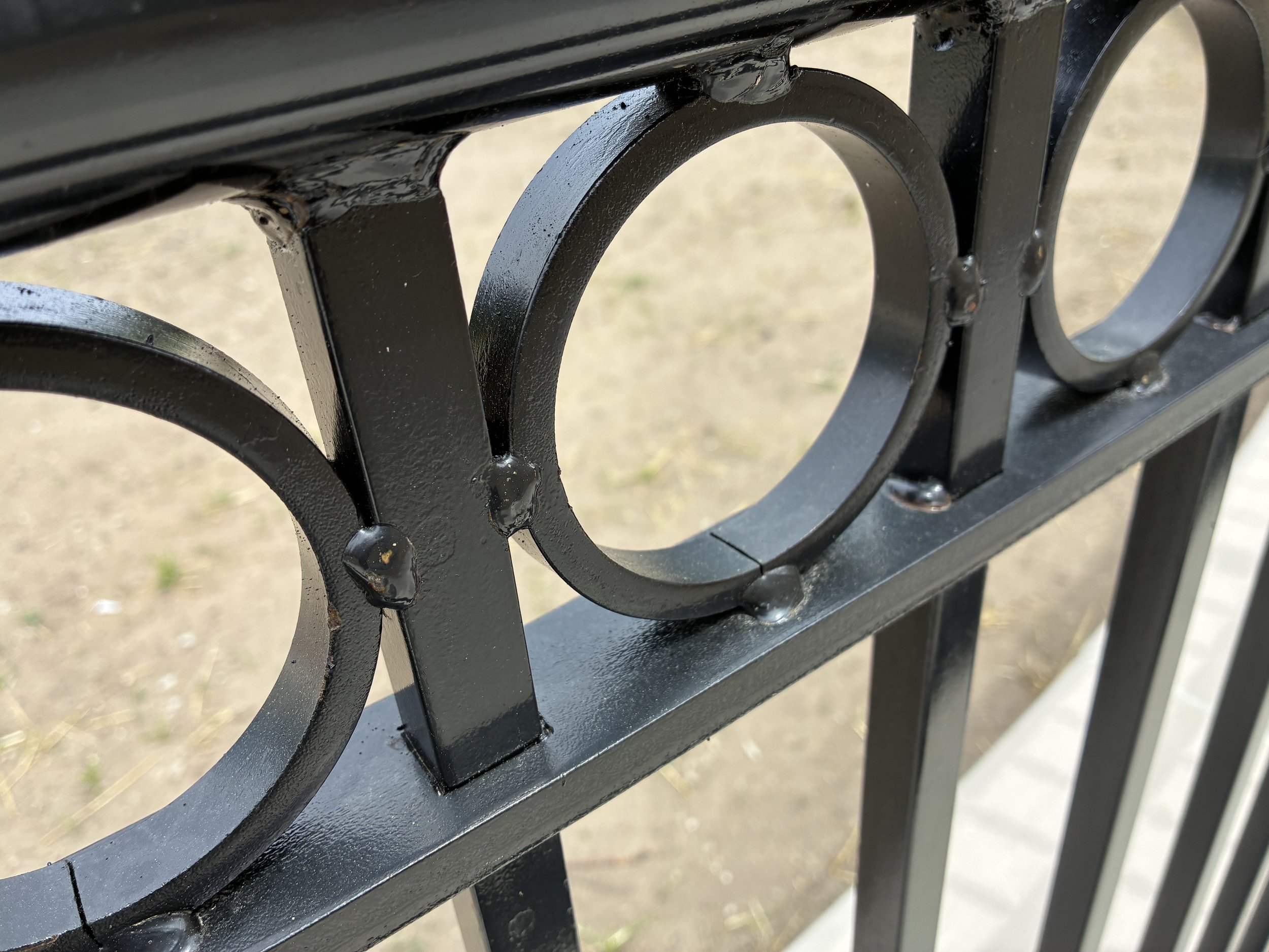 Detail of Fabricated Steel Railings Showing Clean Welds, Smooth Transitions, and Durable Coating at LeMans hall.
