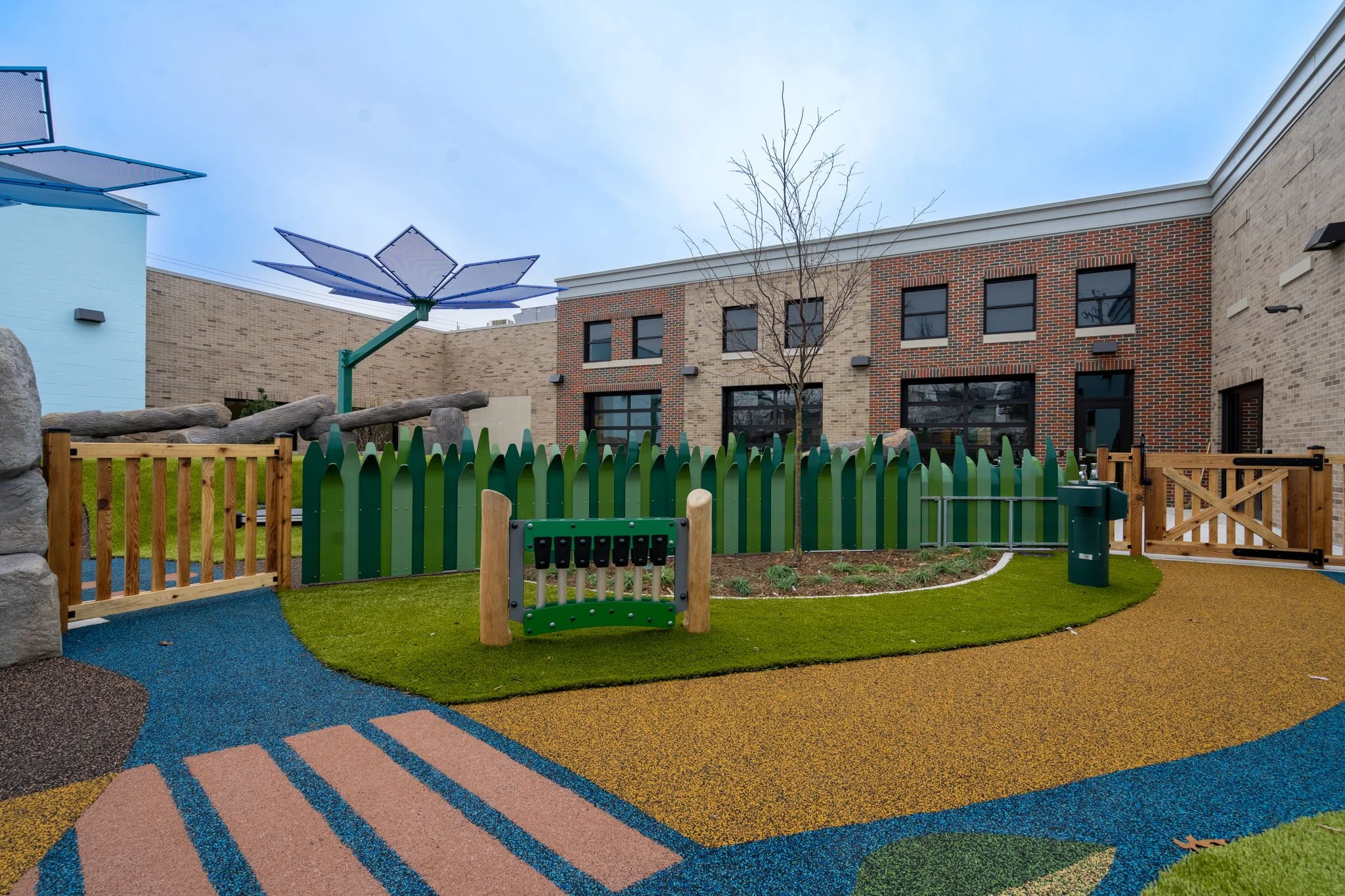 Installed and Completed Playground Environment with Architectural Metal Fencing Systems.