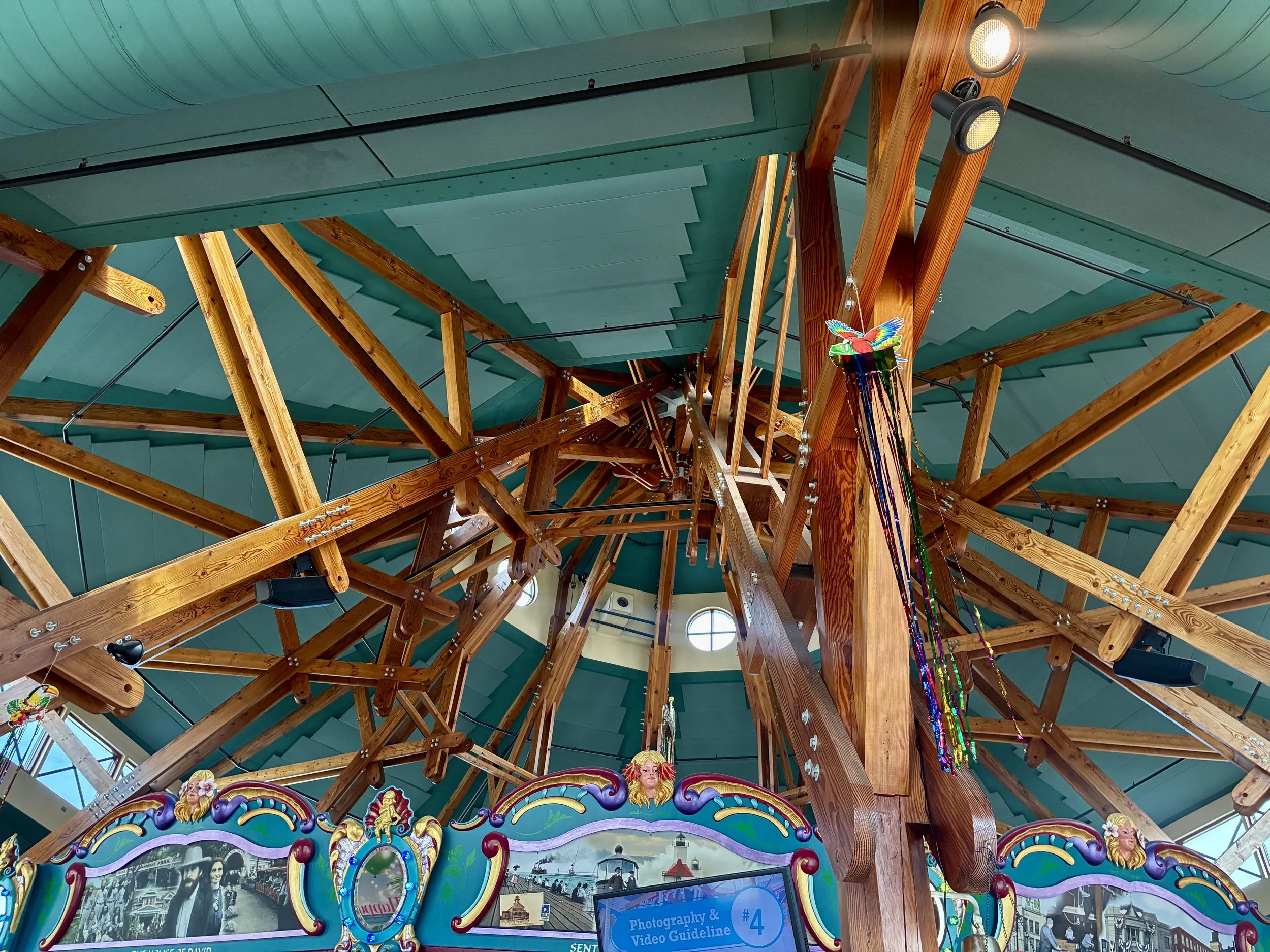 Exposed Structural Framing Supporting the Carousel's Signature Circular Roof Structure.