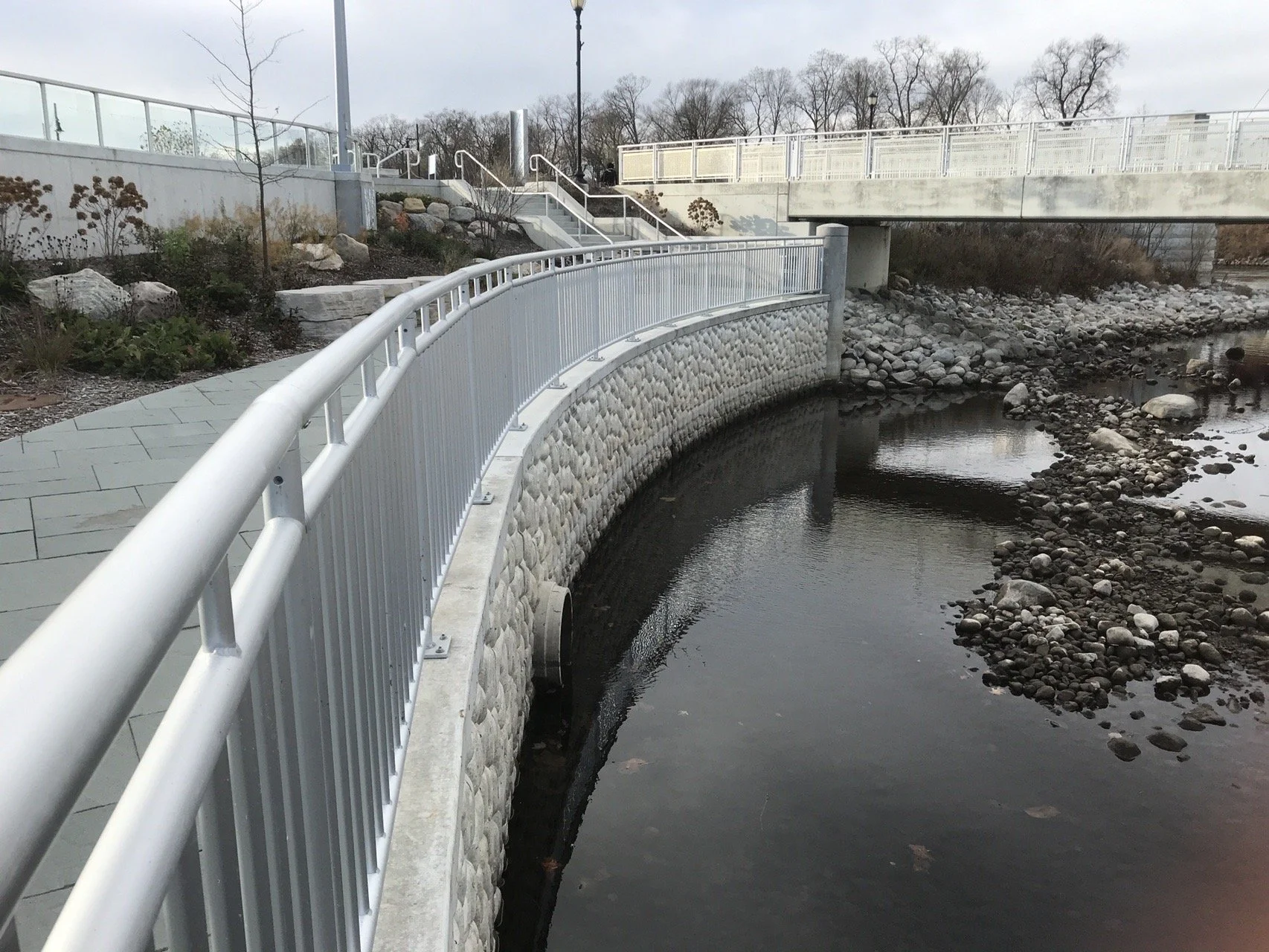 Curved Aluminum Guardrail System Fabricated to Follow the Riverwalk Edge Condition.