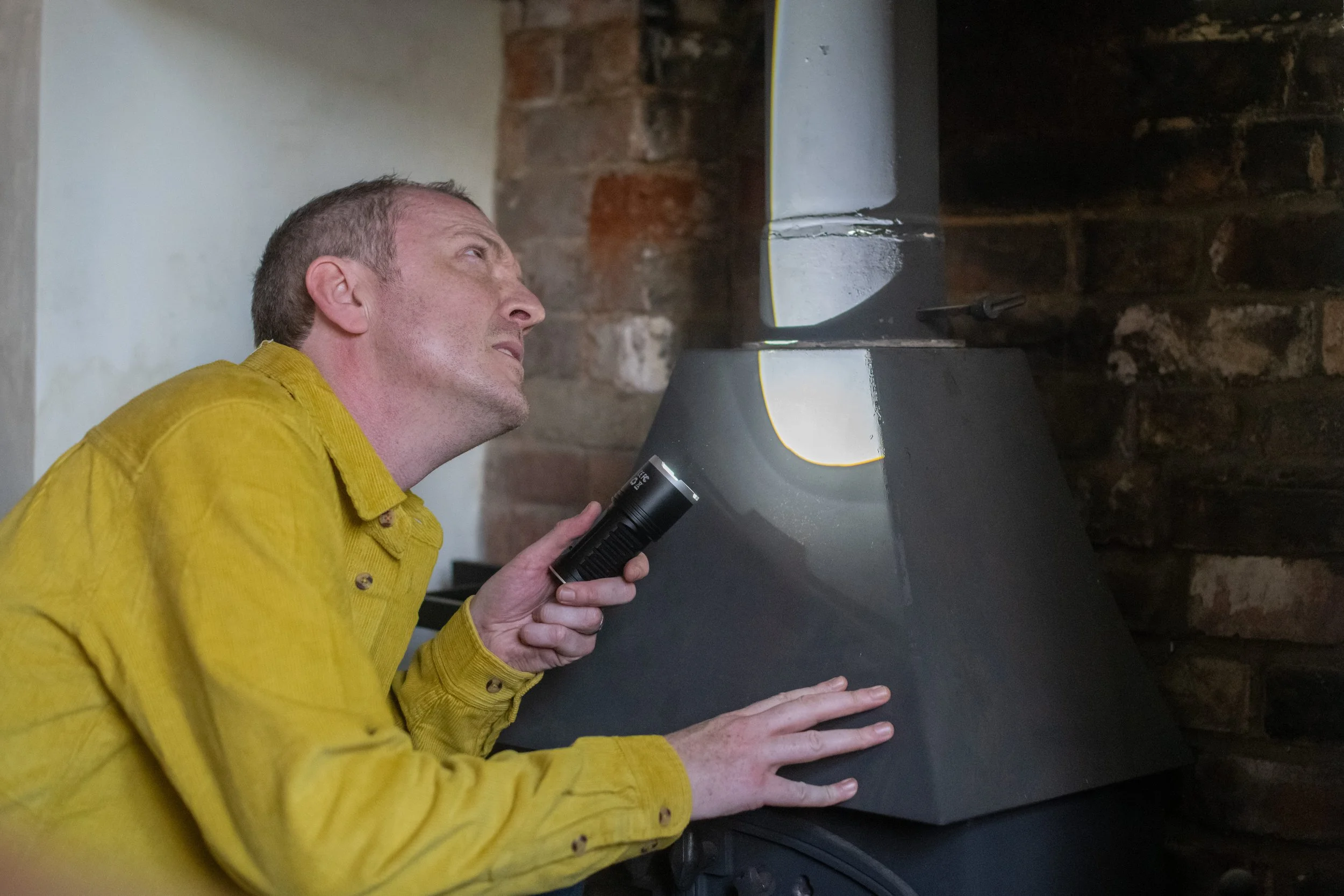 Giles Langford Inspecting a chimney Flue