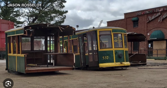 Trolley car removed from former Spaghetti Warehouse