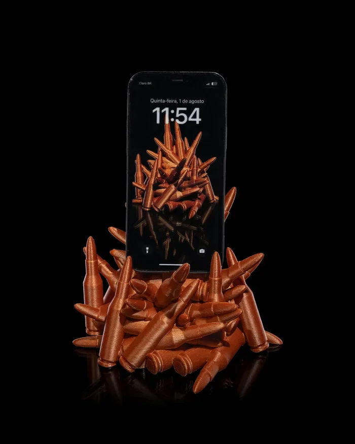 3D Printed Bullet Phone Holder – Bold desktop phone stand featuring a stacked bullet design for a rugged, eye-catching look. Perfect for holding smartphones on desks, nightstands, or gaming setups. Durable 3D printed stand and unique gift