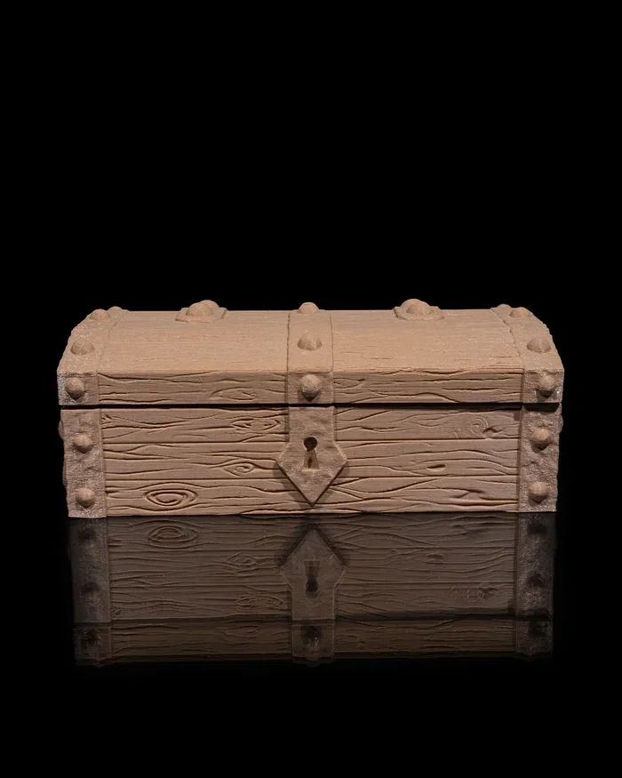 3D Printed Treasure Chest Trinket Box – Decorative storage box styled like a classic treasure chest with detailed woodgrain texture and locking design. Perfect for jewelry, coins, keepsakes, dice, and small treasures.