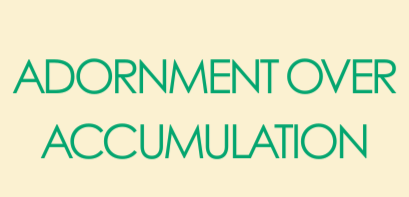 Text reading 'Adornment Over Accumulation' on a light beige background.