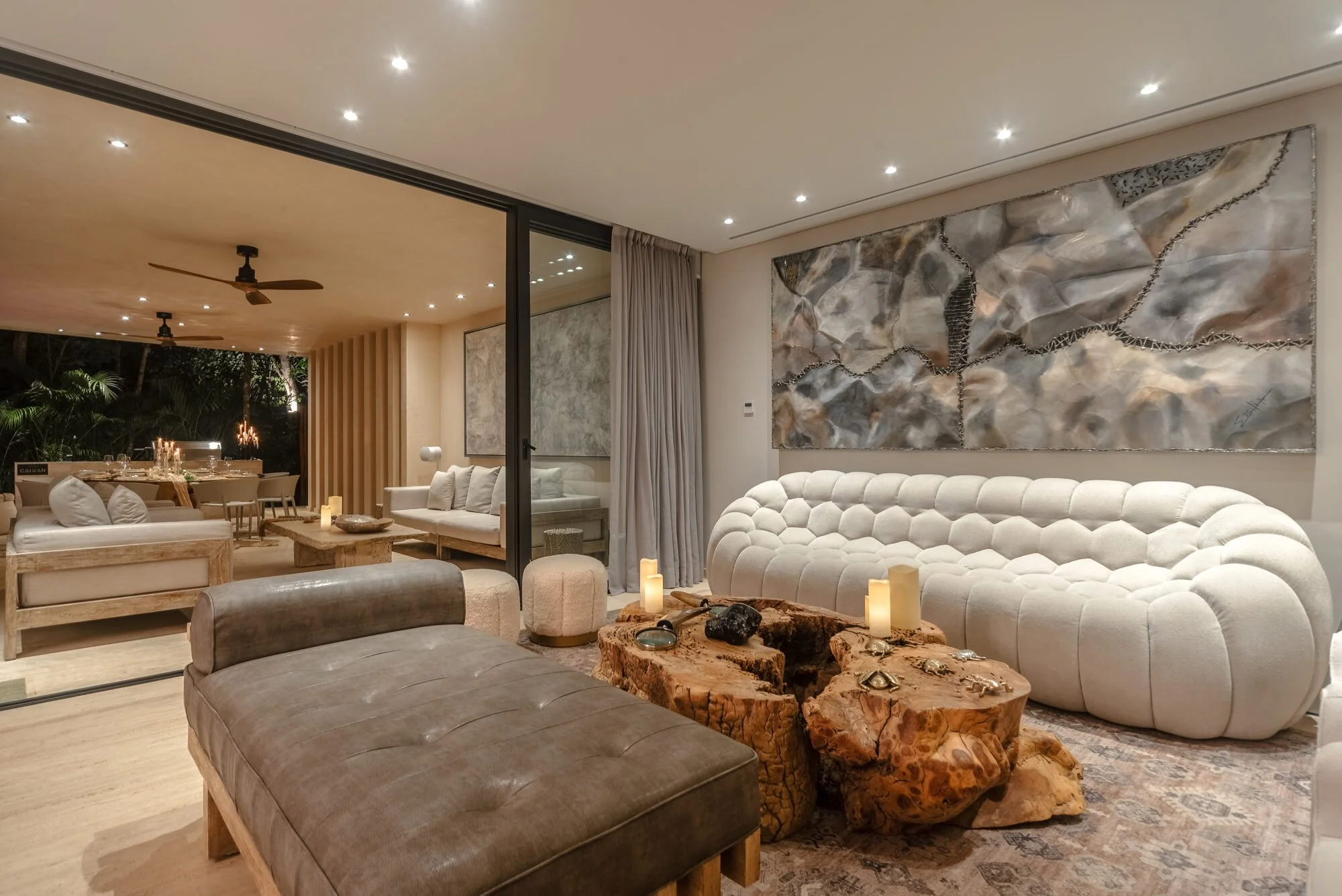 Lounge and living area with designer furnishings at Villa Caimán, Tulum
