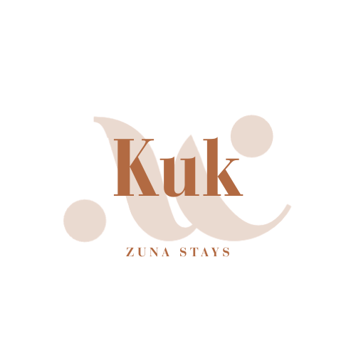 Logo with a stylized butterfly and the text 'Zuna Stays' underneath.