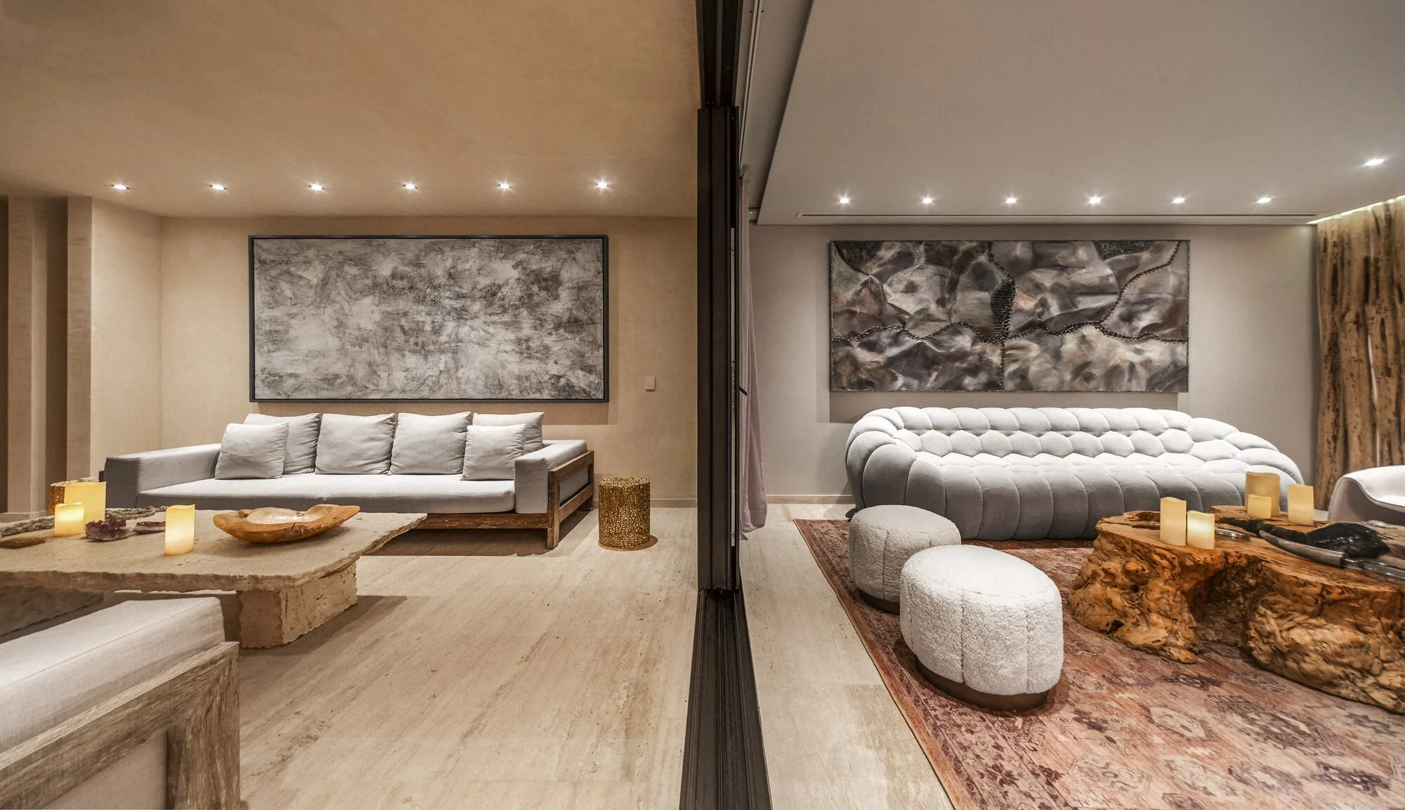 Living lounge with stone feature wall at Villa Caimán, Tulum