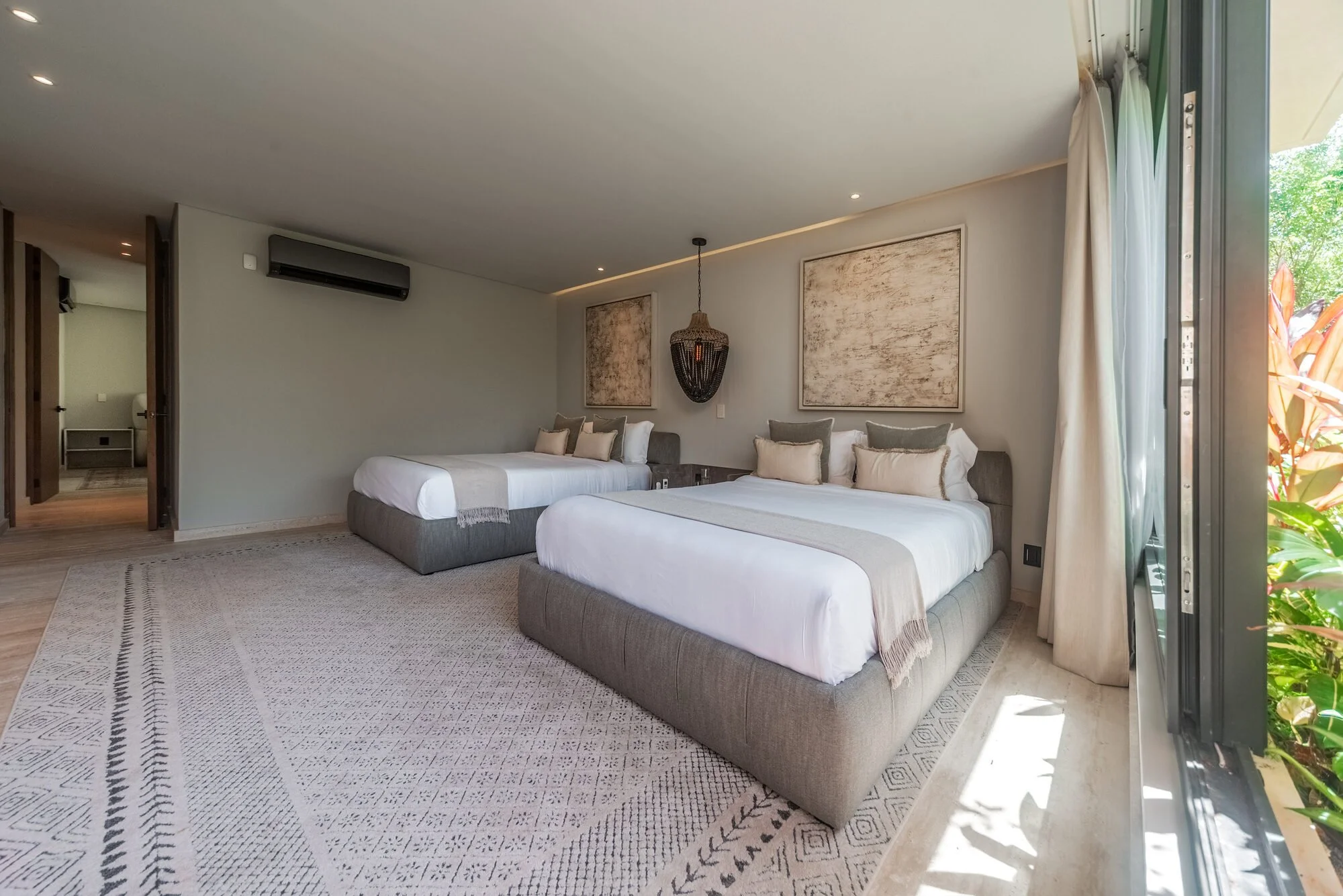 Jungle-view bedroom suite at Villa Caimán, Tulum