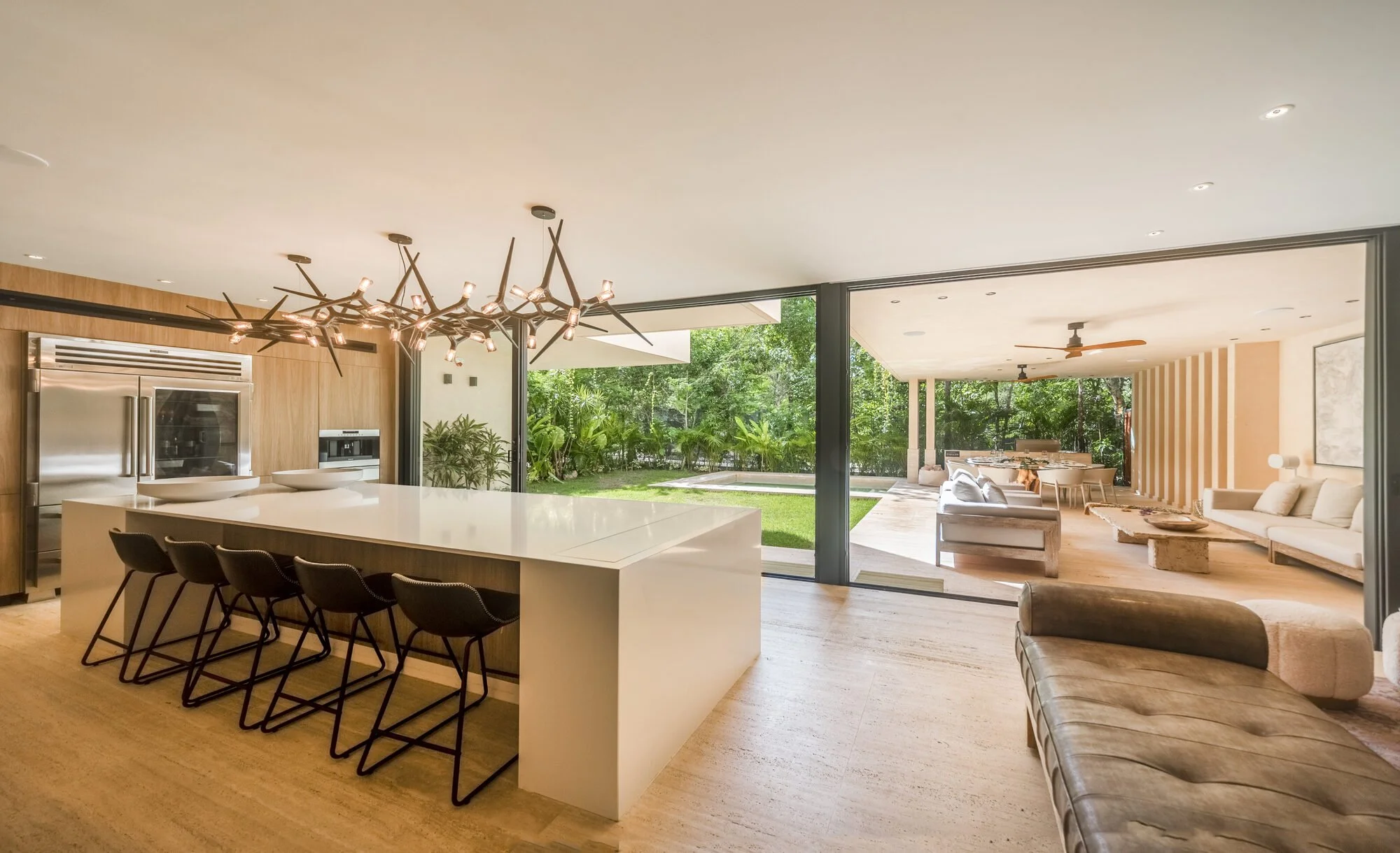 Open-plan kitchen and dining area at Villa Caimán, Tulum