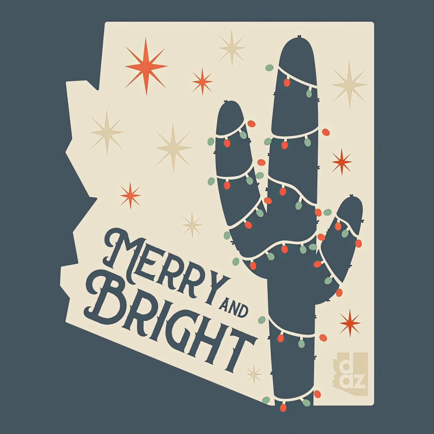 Holiday-themed Arizona apparel graphic featuring a saguaro cactus wrapped in Christmas lights with "Merry and Bright" retro typography.