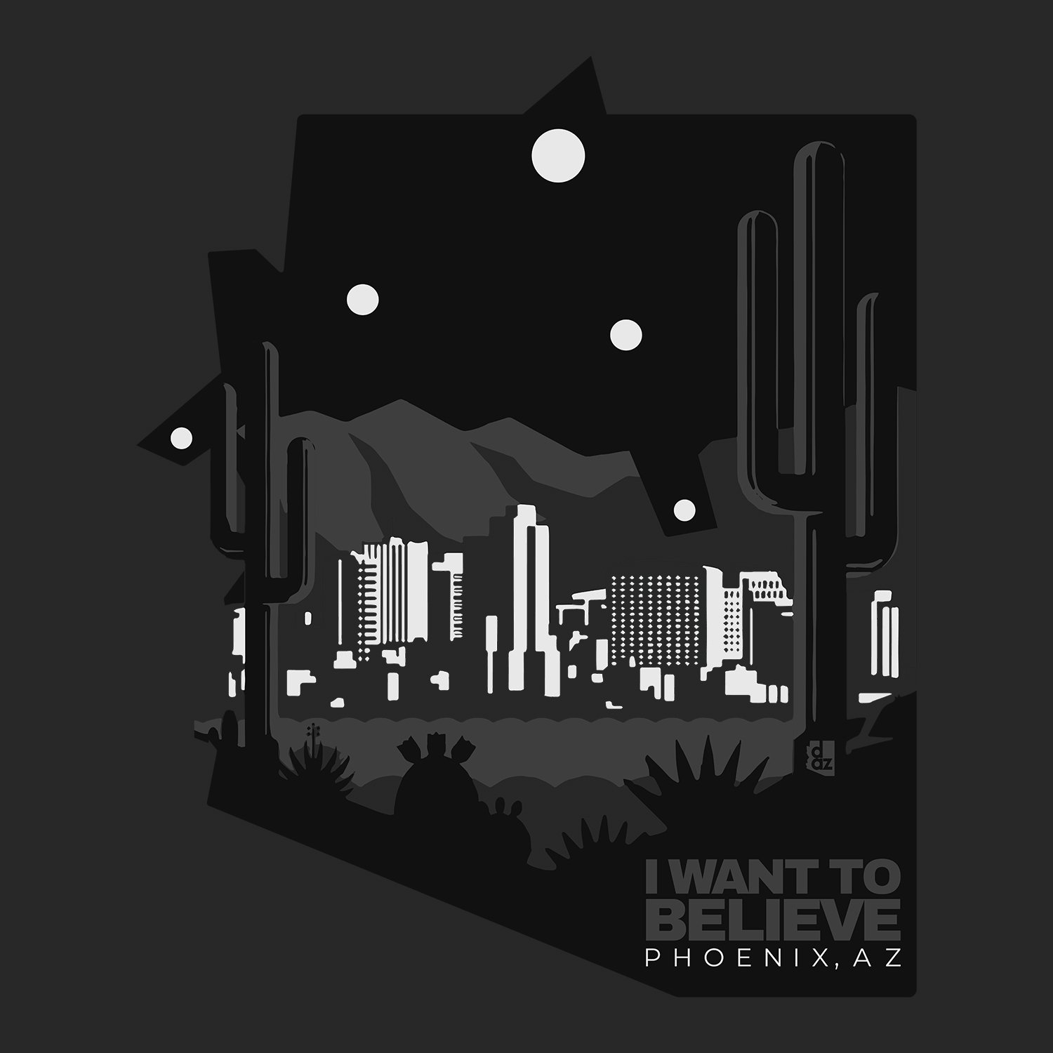 Minimalist black and white graphic apparel design titled "I Want To Believe," featuring the Phoenix skyline, saguaro cacti, and mysterious UFO lights; inspired by the famous "Phoenix Lights" incident.