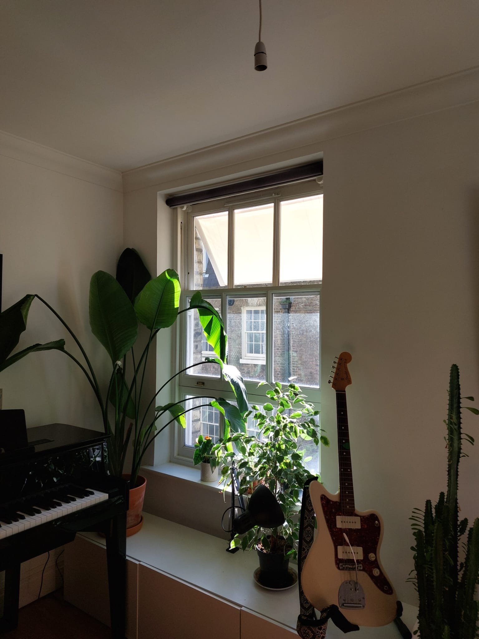 Temporary awning to reduce indoor temperatures