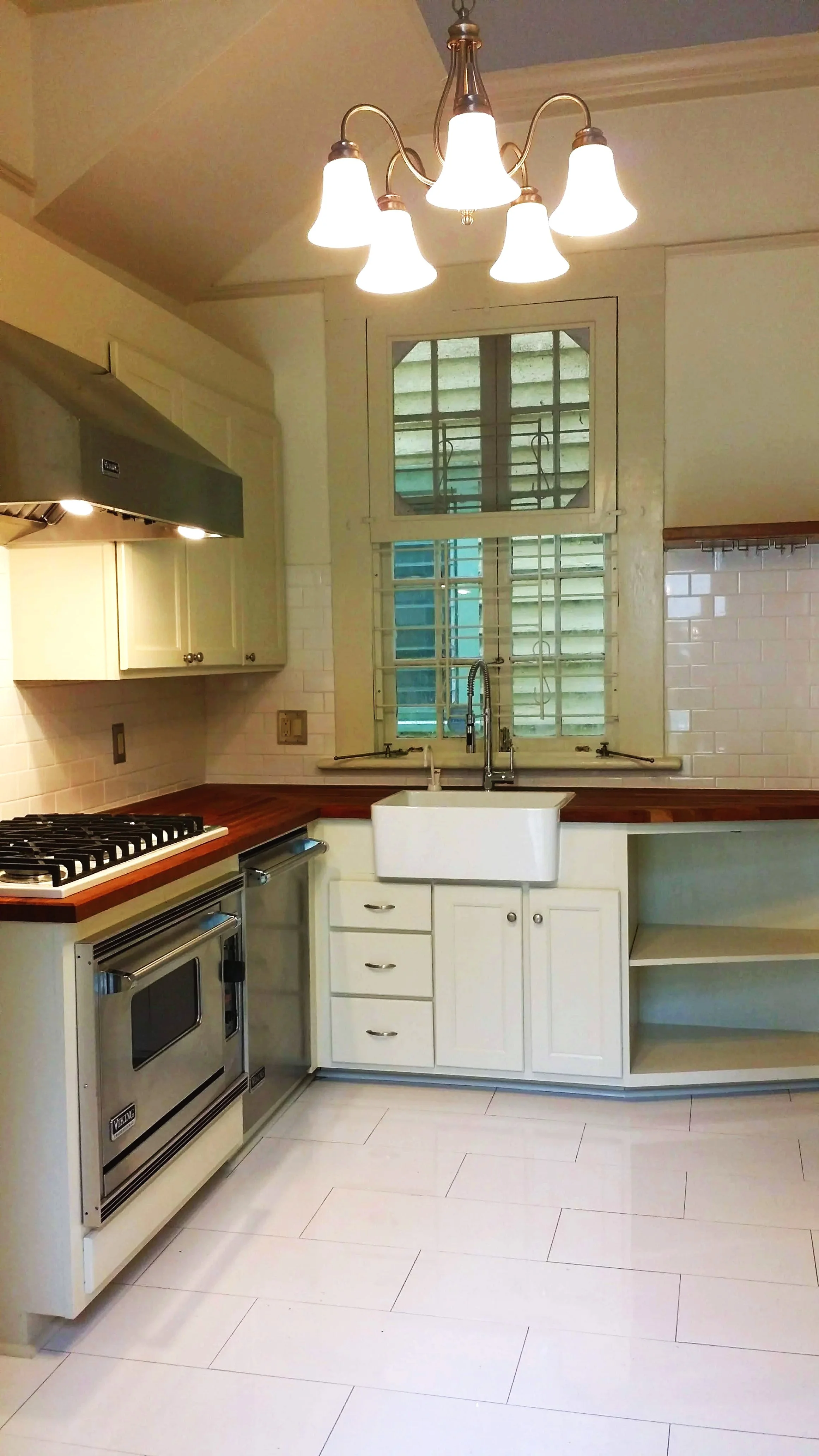 Custom kitchen cabinets built to fit a small, unusual shaped space