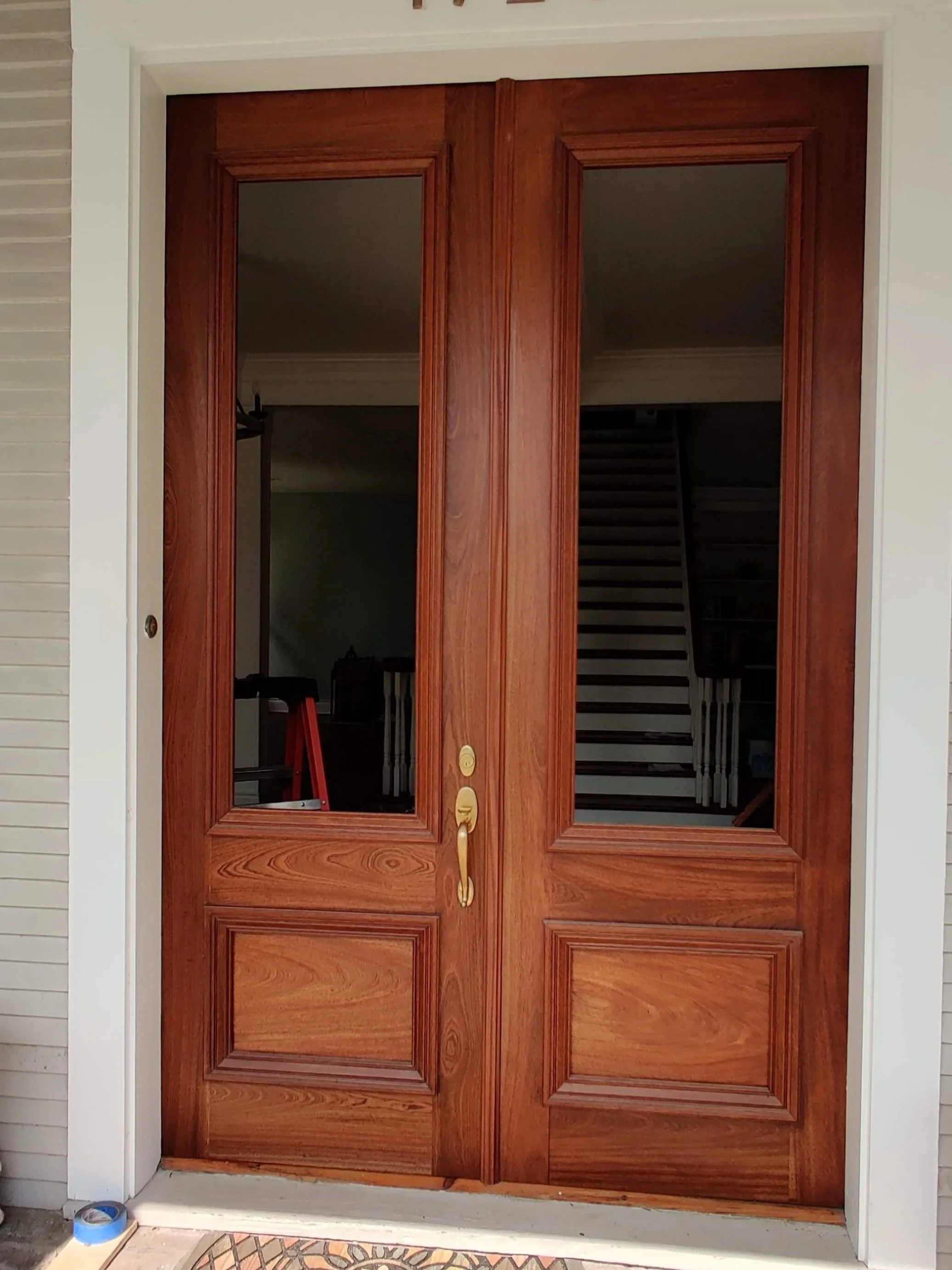 custom mahogany entry doors with transom