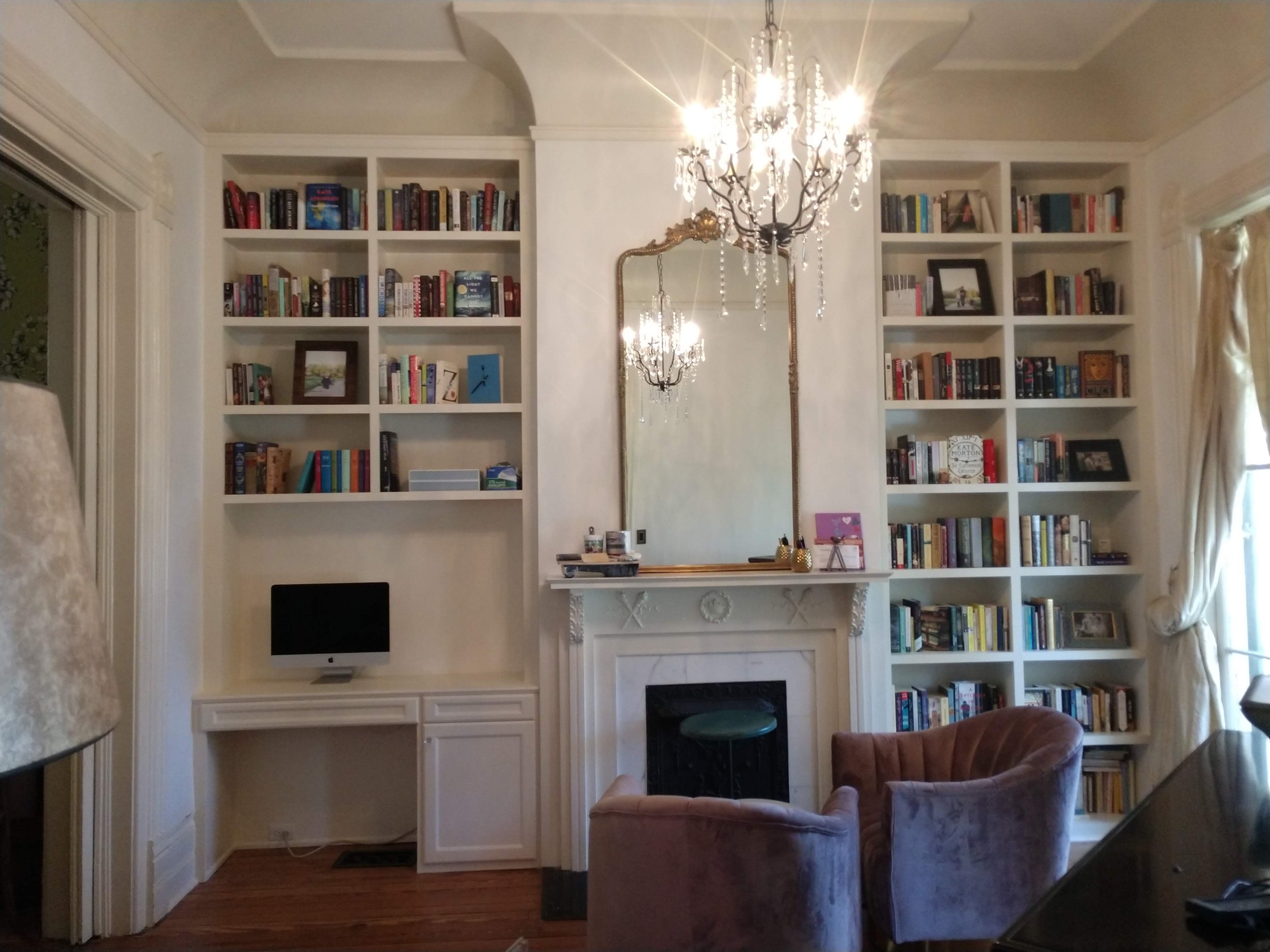 Custom built home office with built-in bookshelves and desk