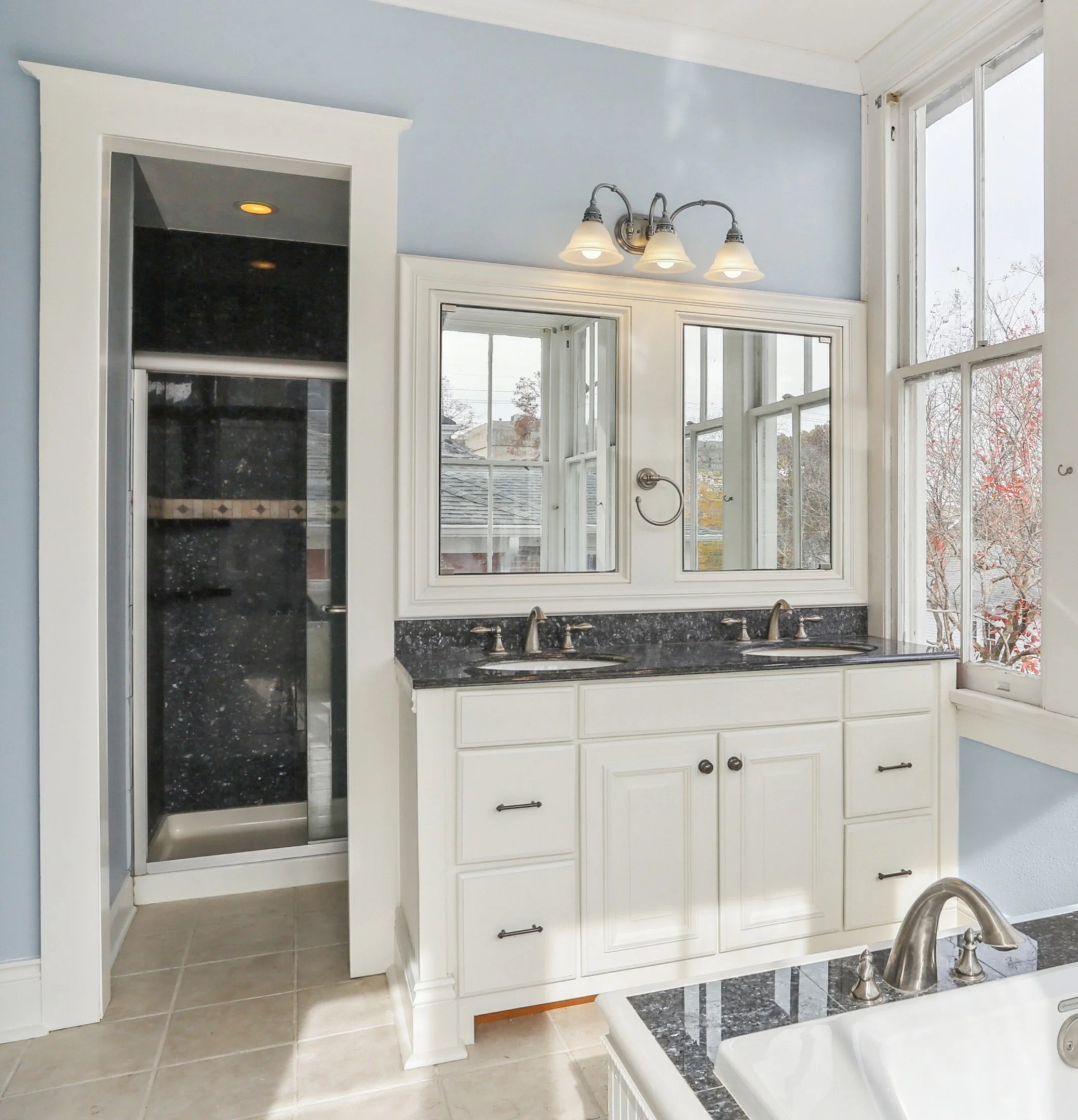 custom vanity with inset mirrored medicine cabinet