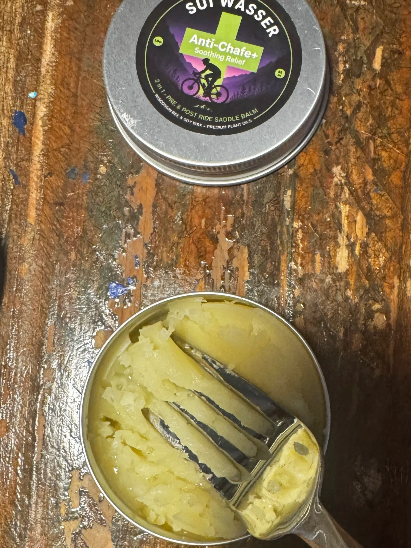 Image demonstrates how to break up balm with a fork.