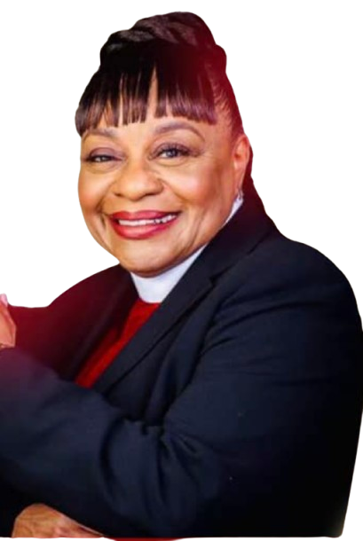 A smiling woman with short hair styled in bangs and an updo, wearing a dark blazer over a red top, against a background with red, gray, green, and blue sections.