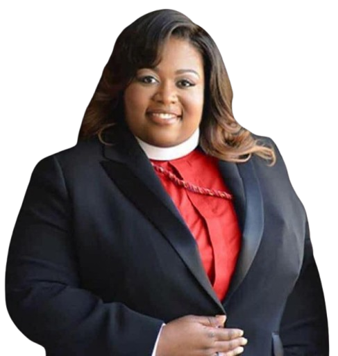 Professional woman with shoulder-length hair, wearing a navy blazer over a red top, smiling, against a black background.