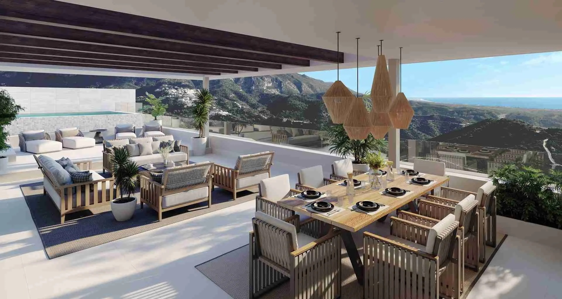Rooftop patio with dining and lounge area in Benahavís, overlooking mountains and sea