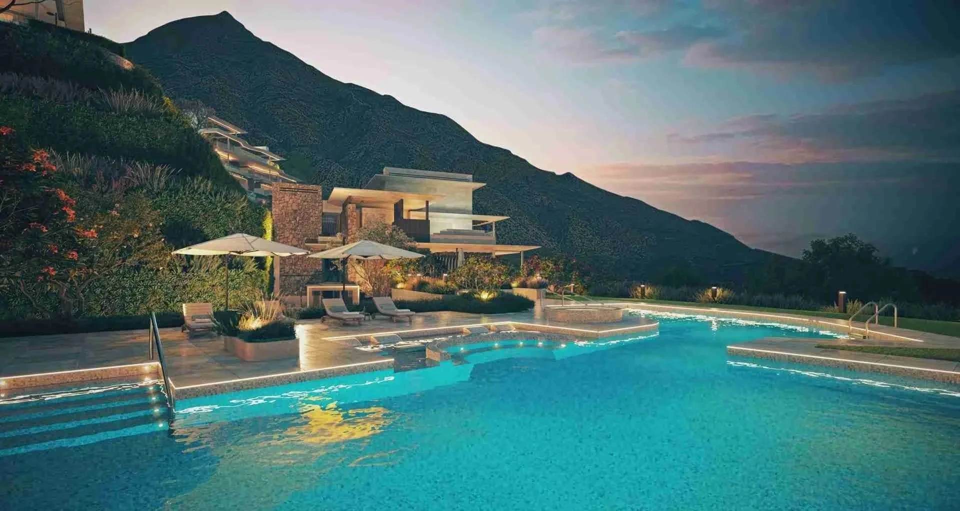 Outdoor swimming pool at Mimosas Real de La Quinta with lounge area and hillside views in Benahavís Marbella