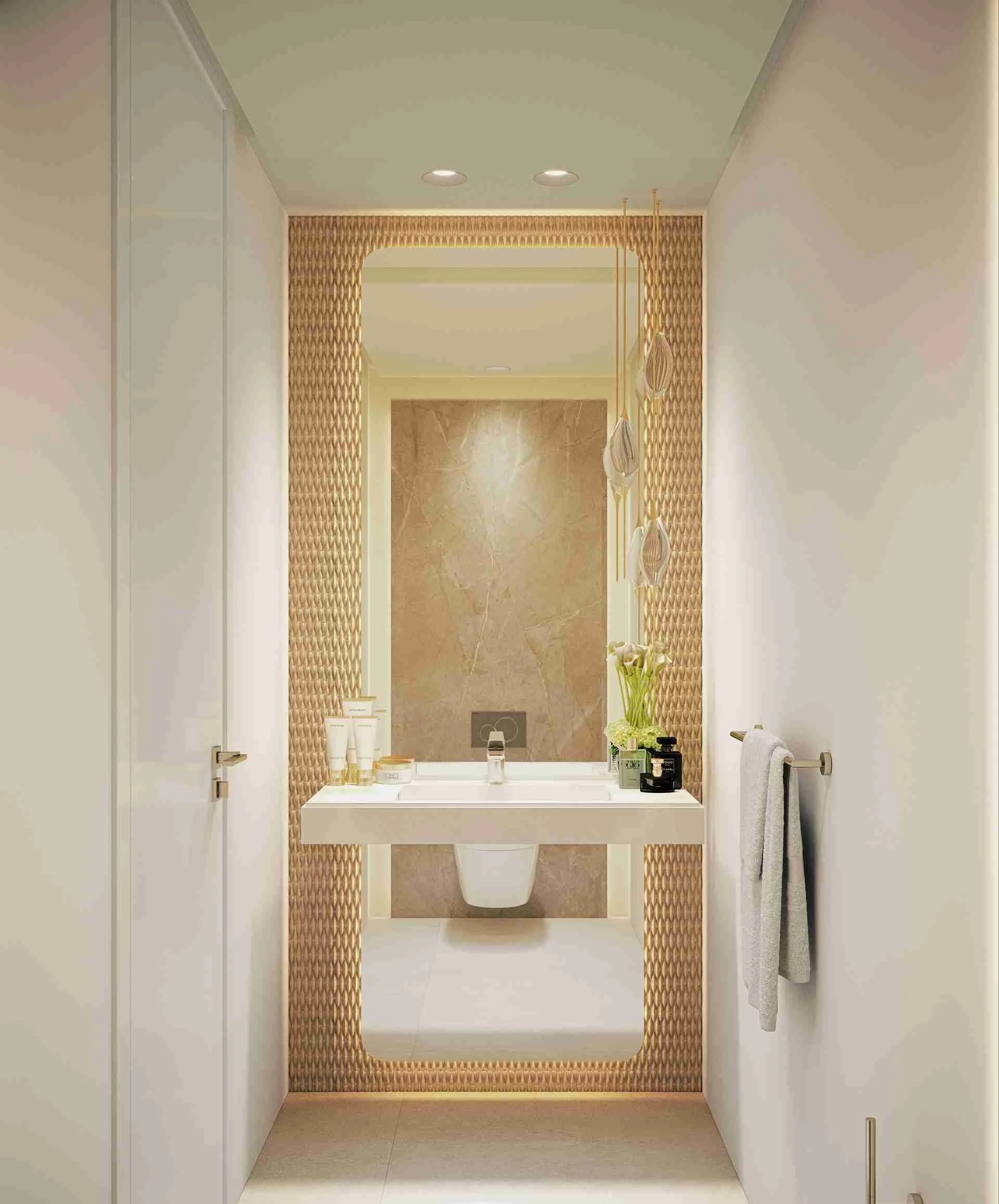 Modern bathroom in Marbella apartment with gold accents, double sinks, and floral décor