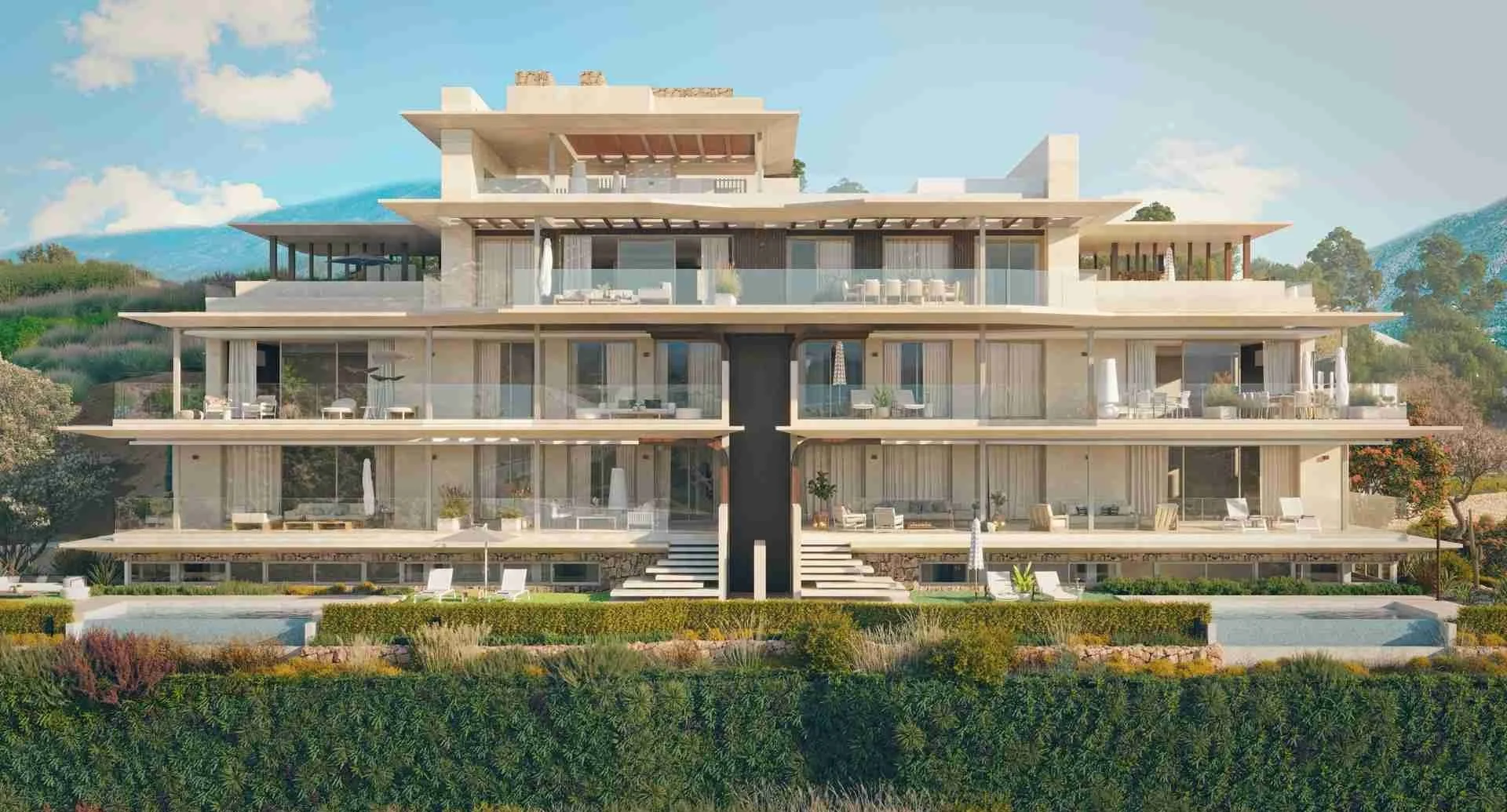 Contemporary apartment building at Mimosas Real de La Quinta with pool, terraces, and surrounding nature