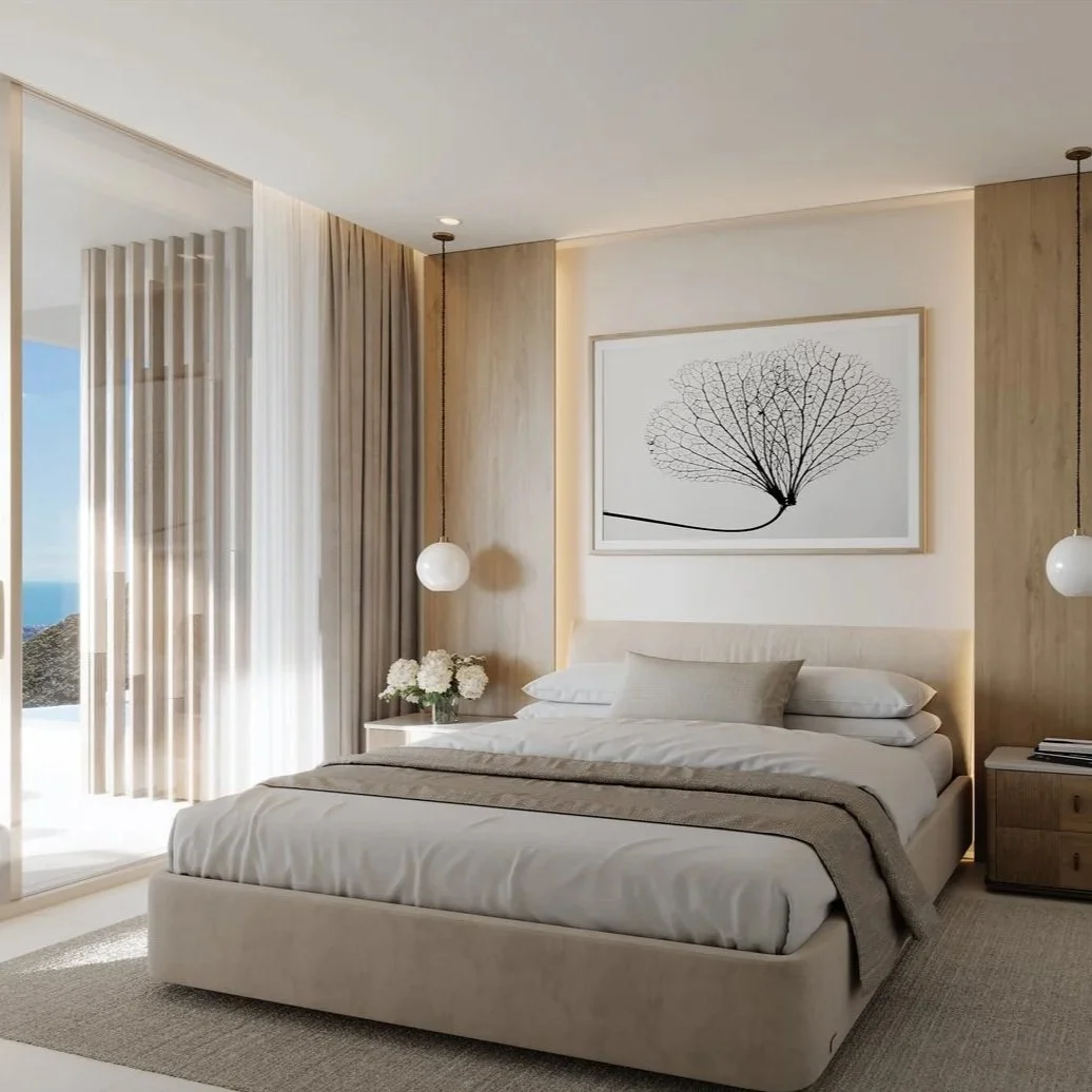 Modern bedroom in La Quinta with beige bed, pendant lights, and sliding doors to outdoor terrace