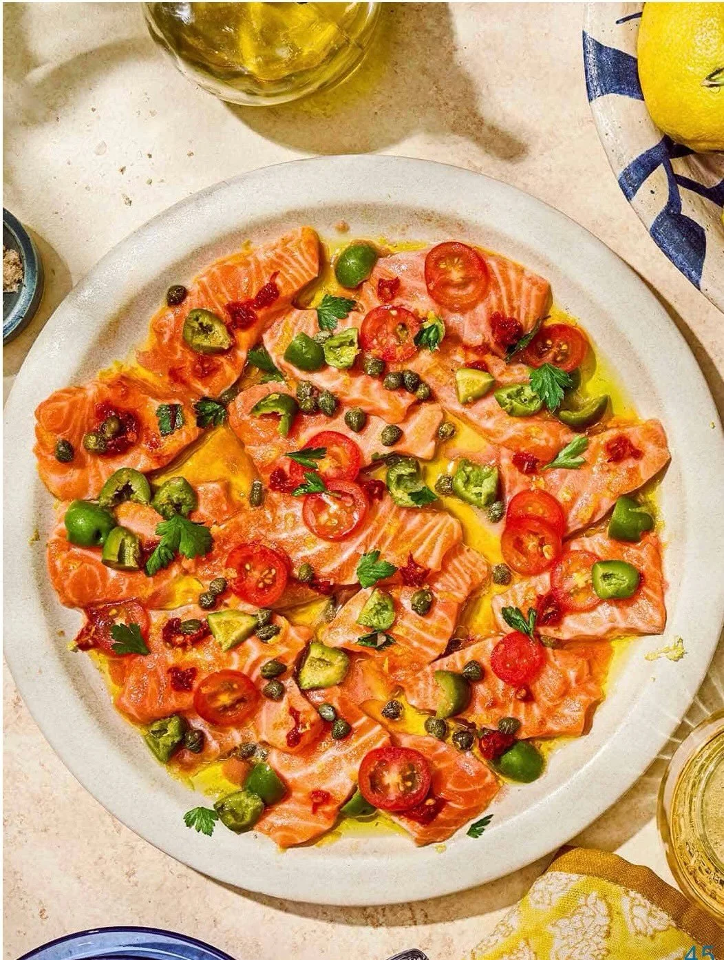My recipe for Salmon Puttanesca Crudo is now live on @themediterraneandish! Ask your fishmonger for the freshest piece of salmon they&rsquo;ve got and dress it with the funky, bright flavors of puttanesca&mdash; a perfect appetizer for hot summer aft