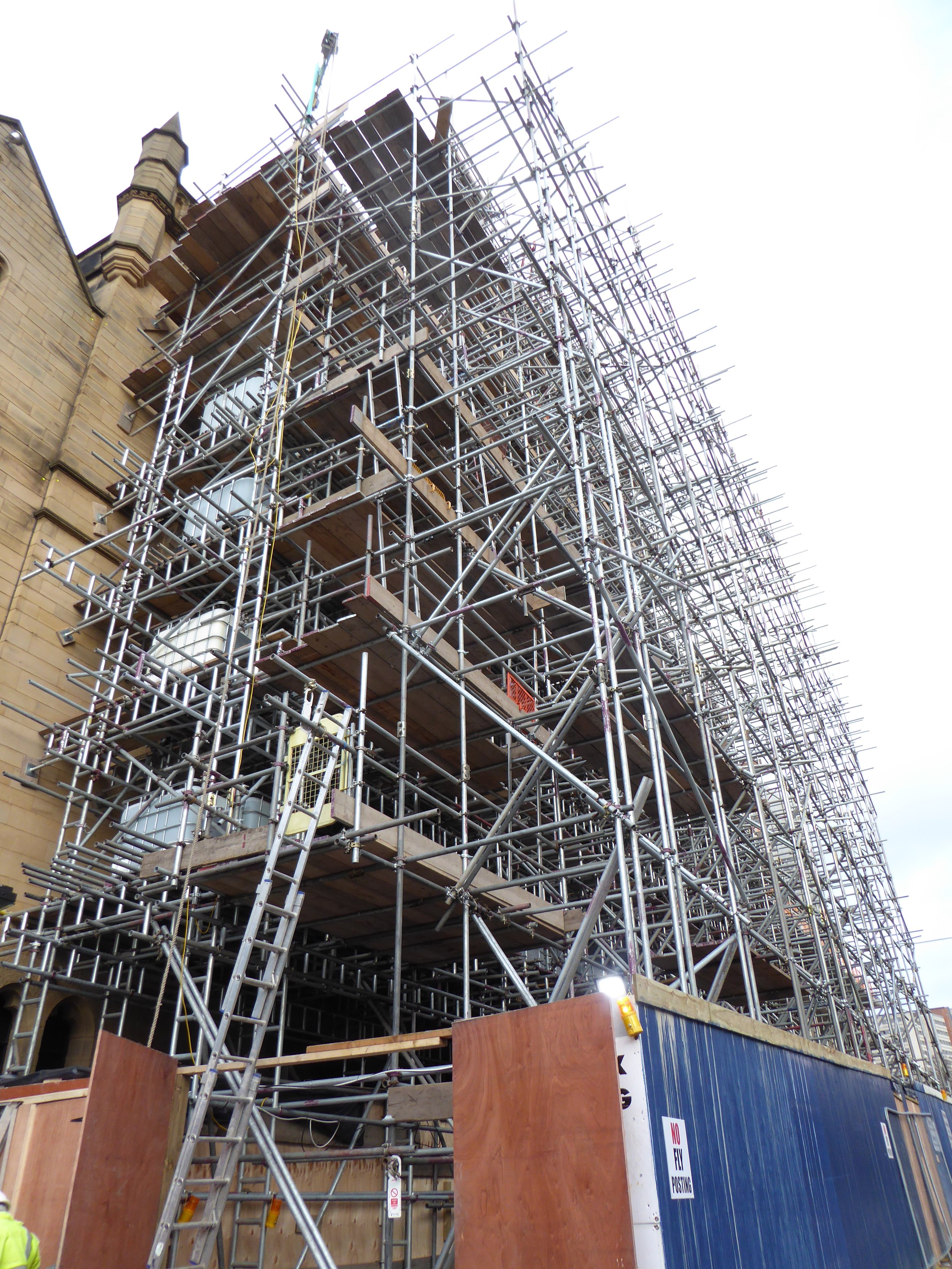 Construction scaffolding surrounding a building