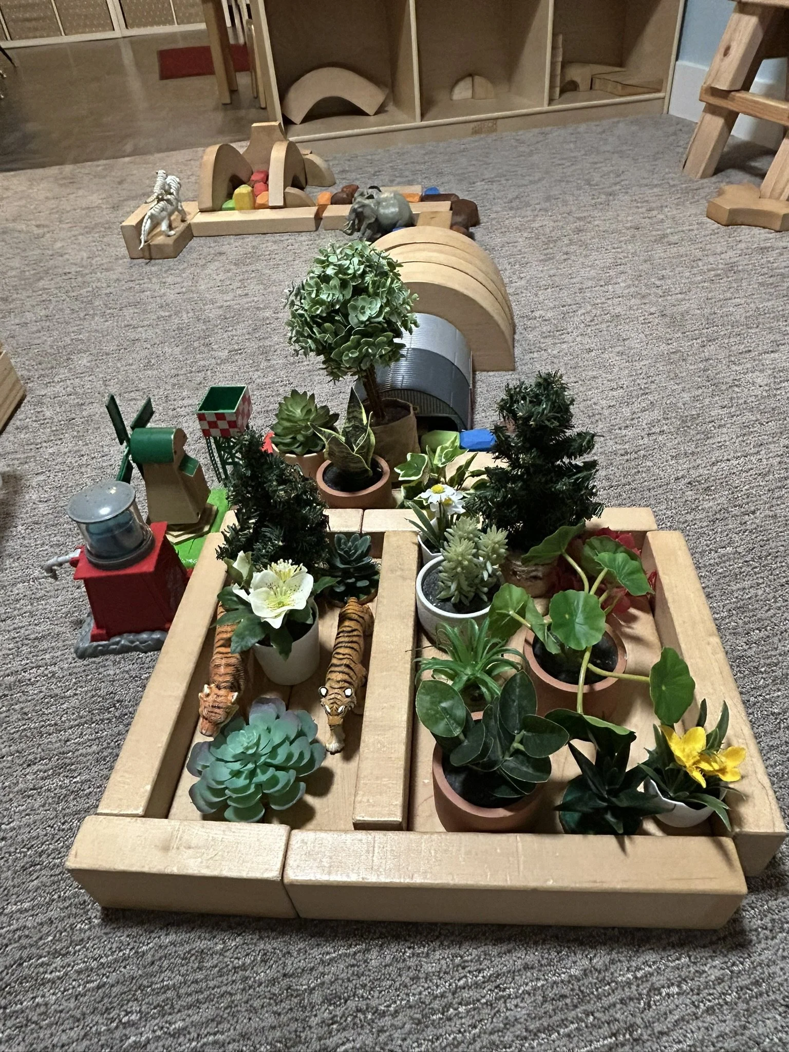 Fake plants and wooden blocks at Beaumont Children's Center bilingual Chinese preschool in Portland, Oregon