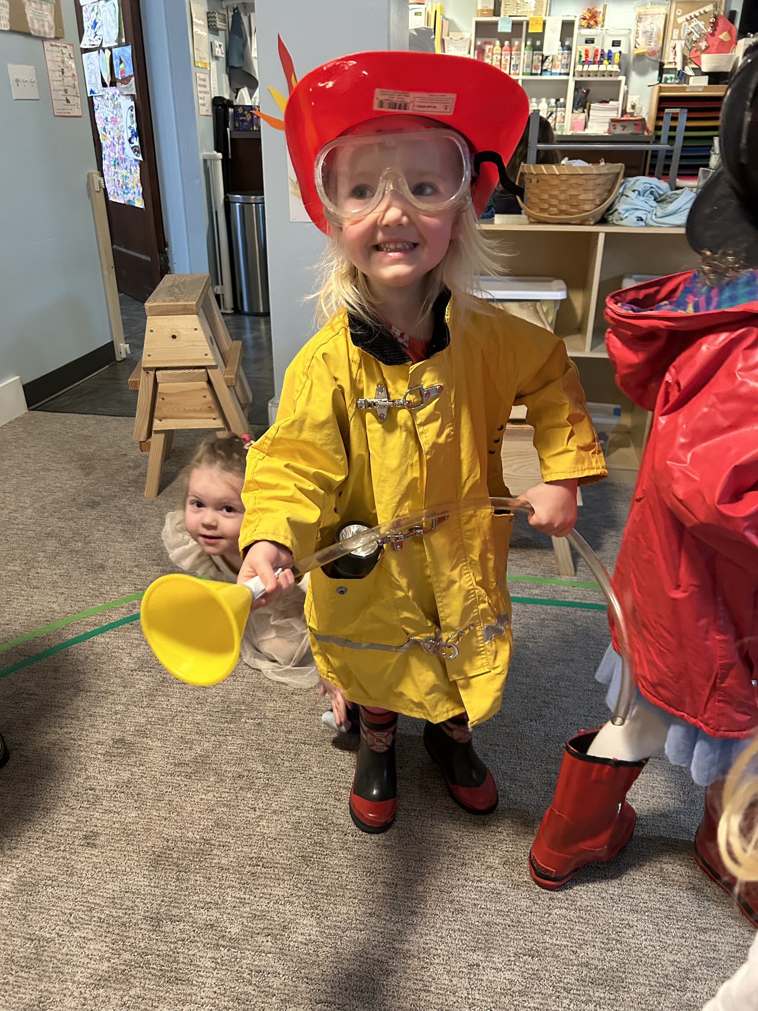 Kids playing dress up at Beaumont Children's Center bilingual Chinese preschool in Portland, Oregon