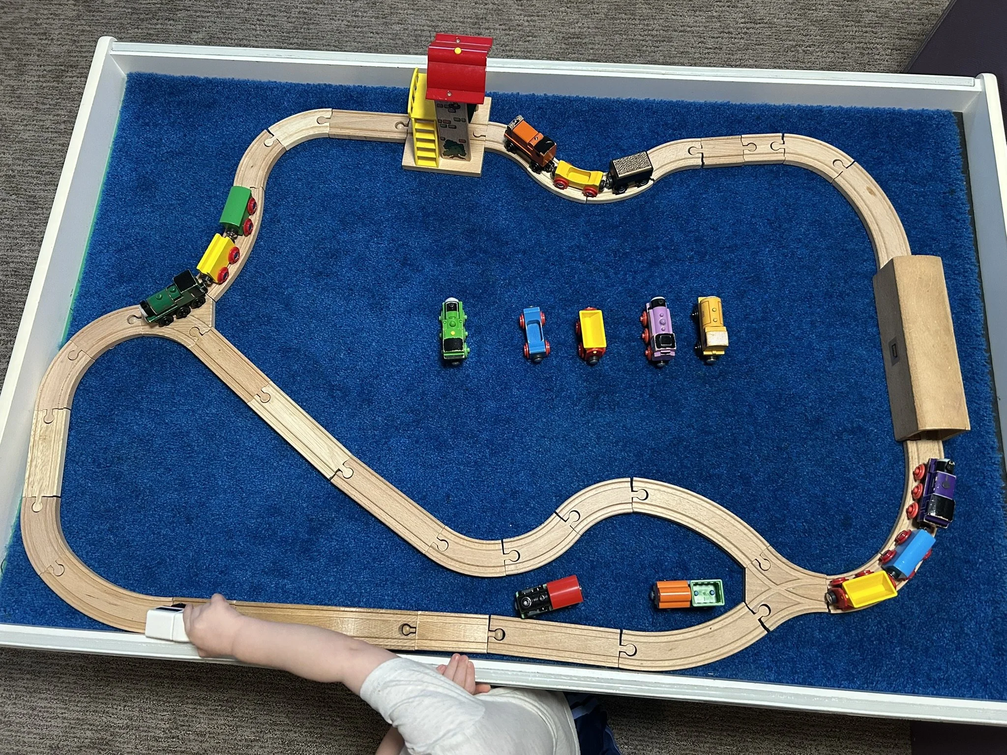 Wooden tracks and trains at Beaumont Children's Center bilingual Chinese preschool in Portland, Oregon