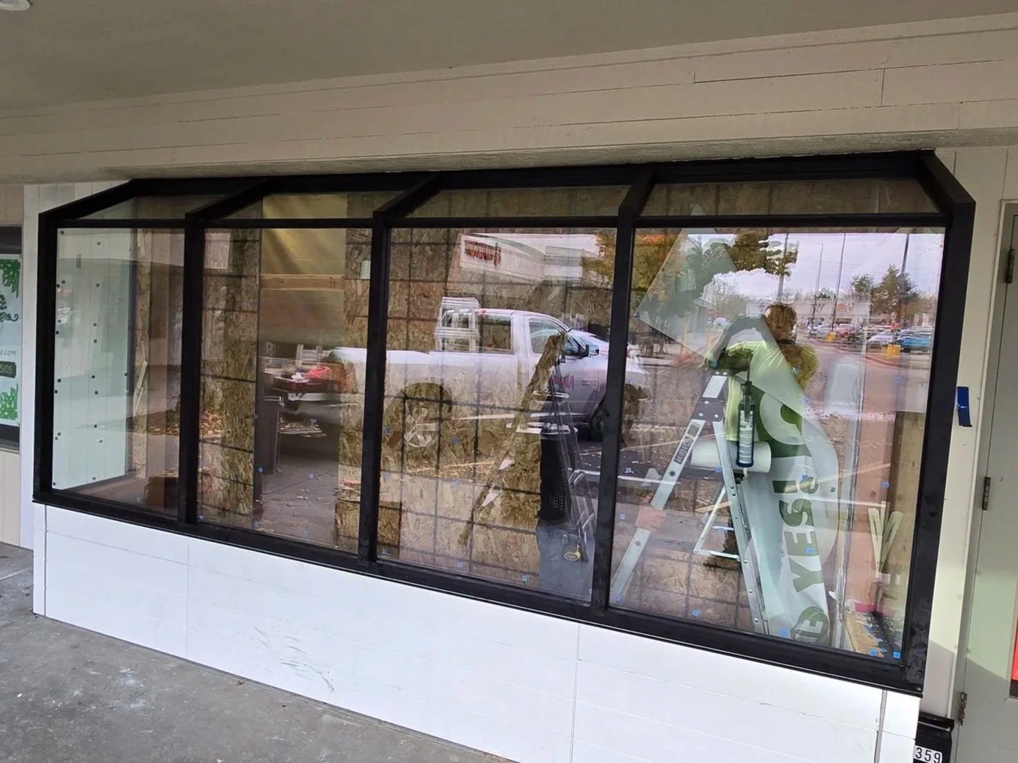 car damage repair. custom sun room.  custom storefront