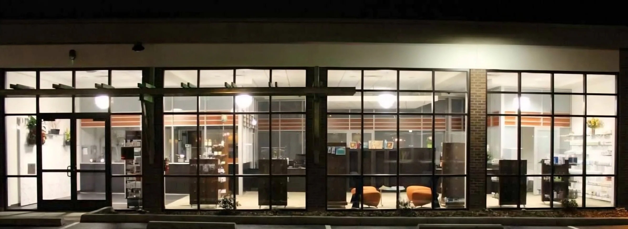 Storefront repair. car through storefront damage. black storefront. bronze anodized storefront