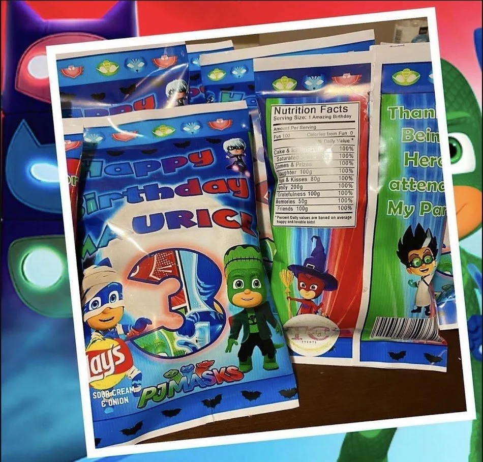 Plastic party favor bags with PJ Masks characters and birthday themed designs, placed on a table with colorful background.