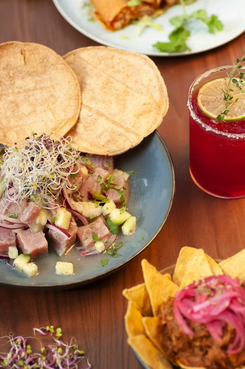 Catch of the Day Ceviche                    Cured in lime and tossed with cilantro, cucumber, and red onion. Bright acidity, fresh herbs, and balance