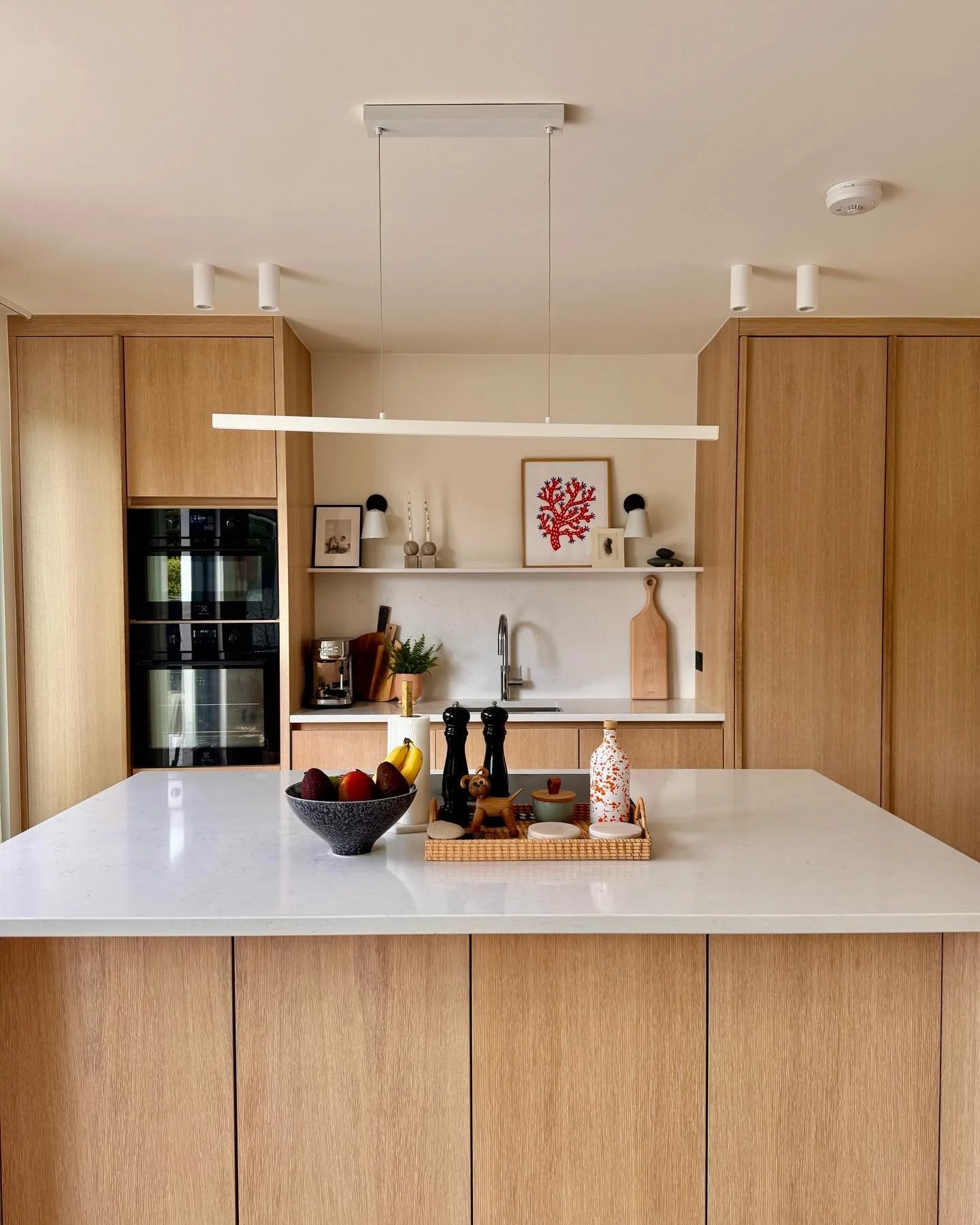 This quite compact kitchen had to do a lot for our clients in Blackrock. Busy daily family life, but built to also grow for hosting extended family at Christmas. 

Drawers line the back of the island, room at the front for non daily essentials like c