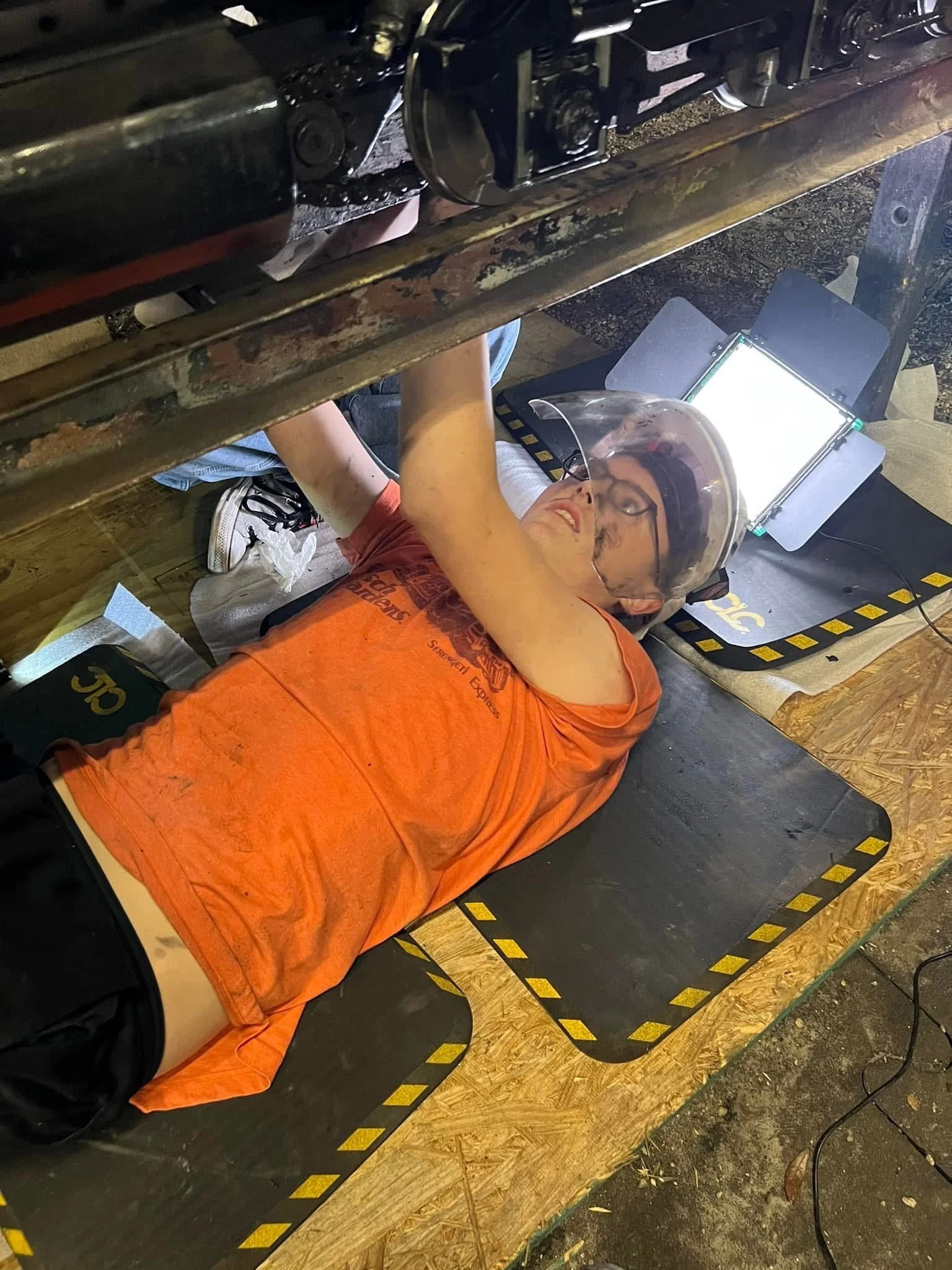 Geometric drawing of an outline square with sections divided by vertical, horizontal, and diagonal lines.