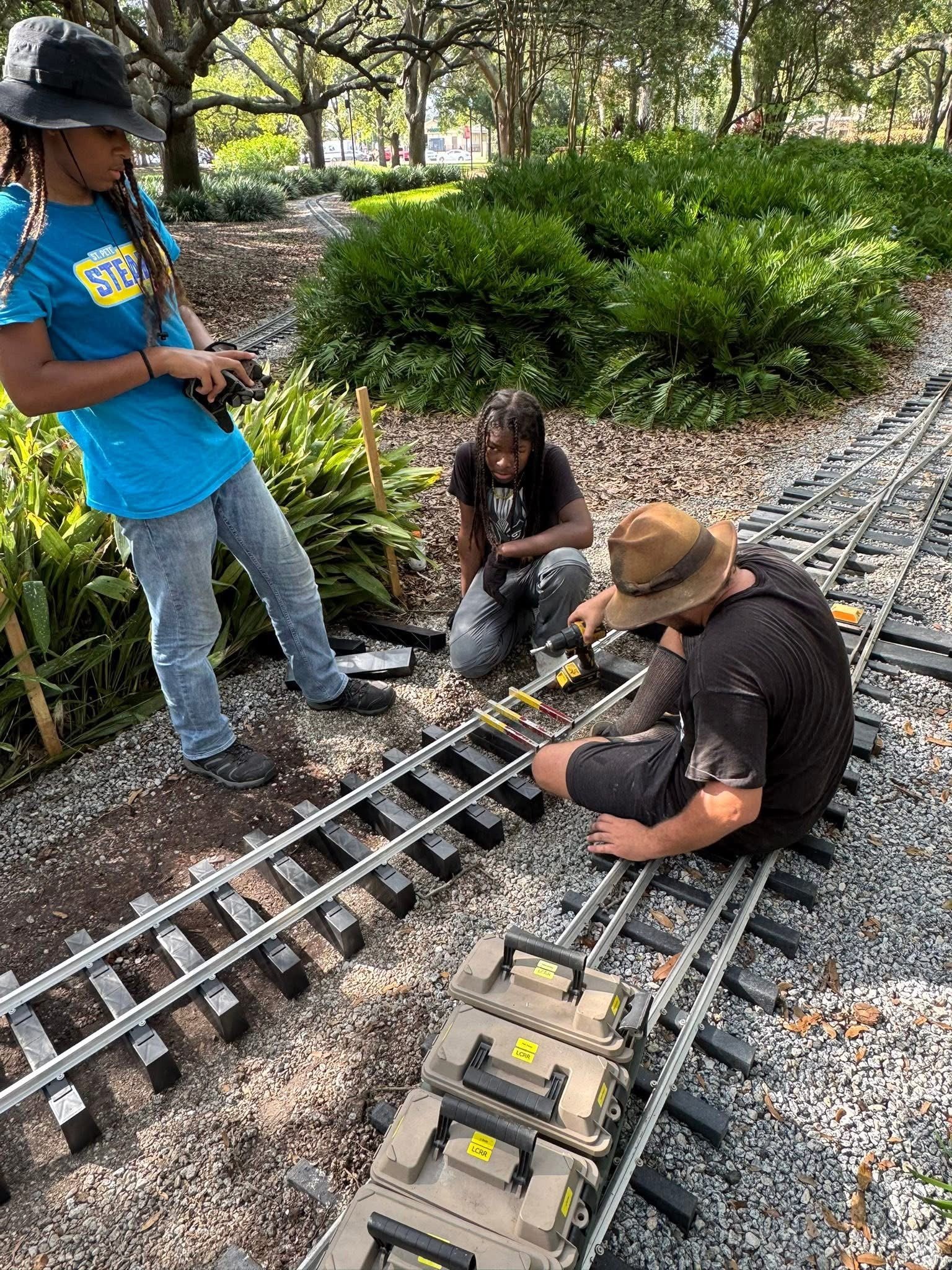 Geometric drawing of an outline square with sections divided by vertical, horizontal, and half circle lines.