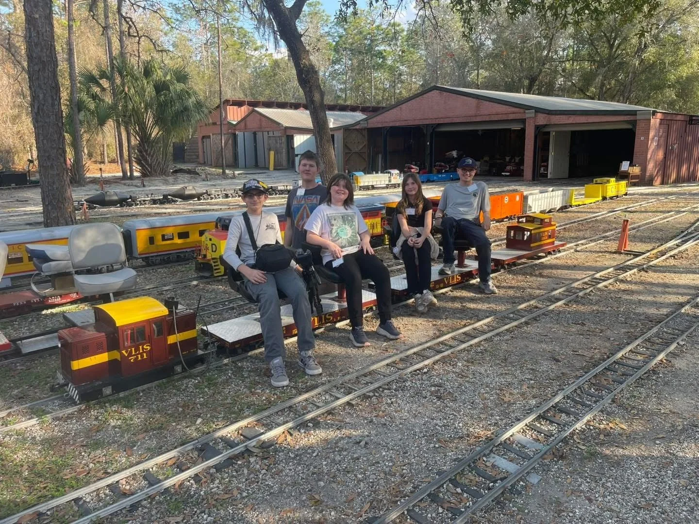 Geometric drawing of an outline square with sections divided by vertical, horizontal, and diagonal lines.