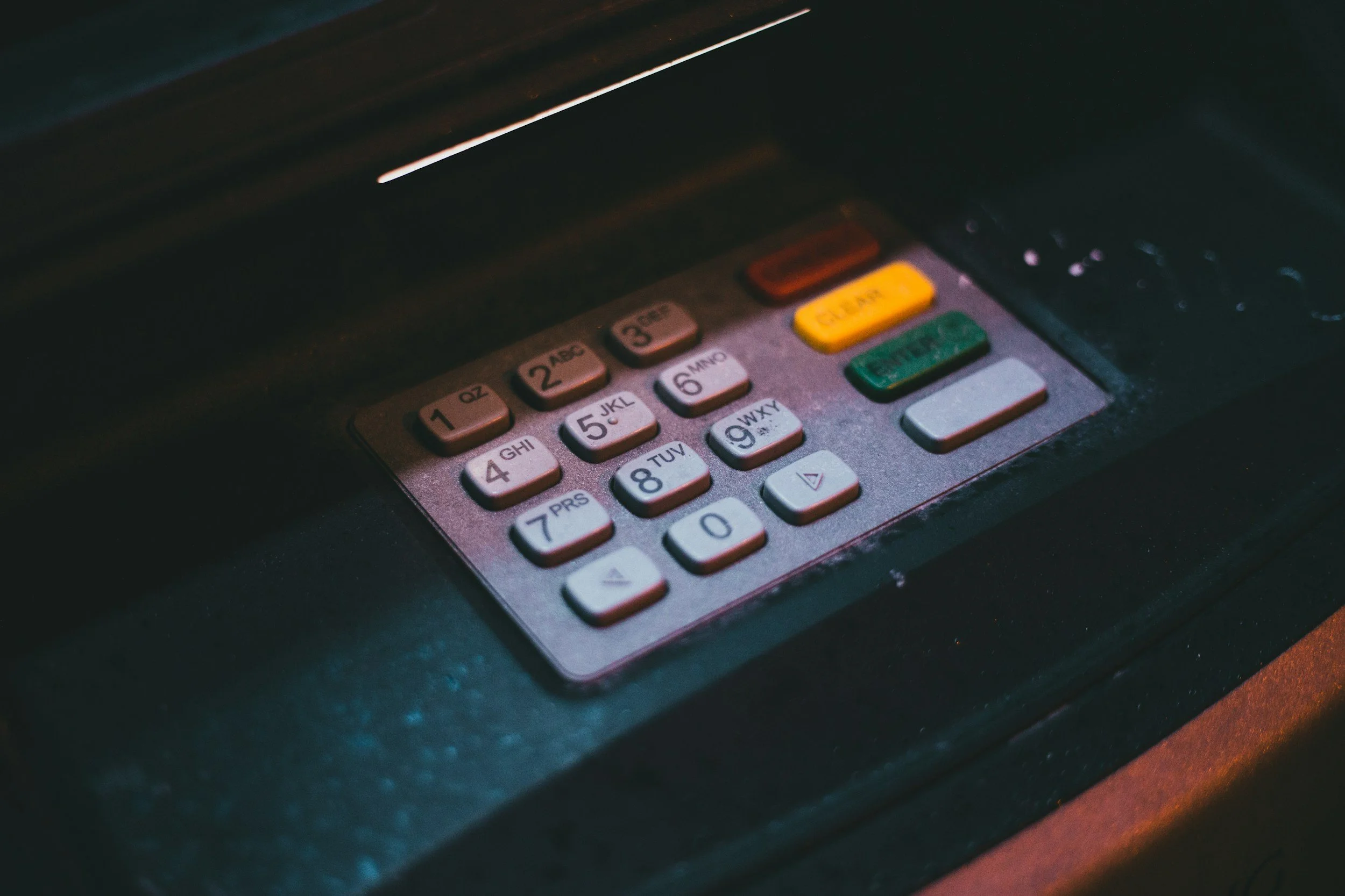 An upclose view of an ATM keypad